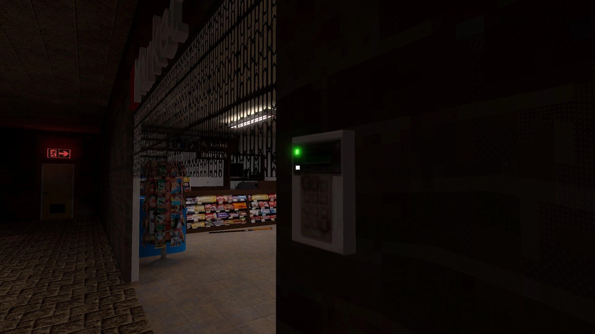 Spori: Viewing a keypad with green light beside a shuttered kiosk in a dim mall corridor.