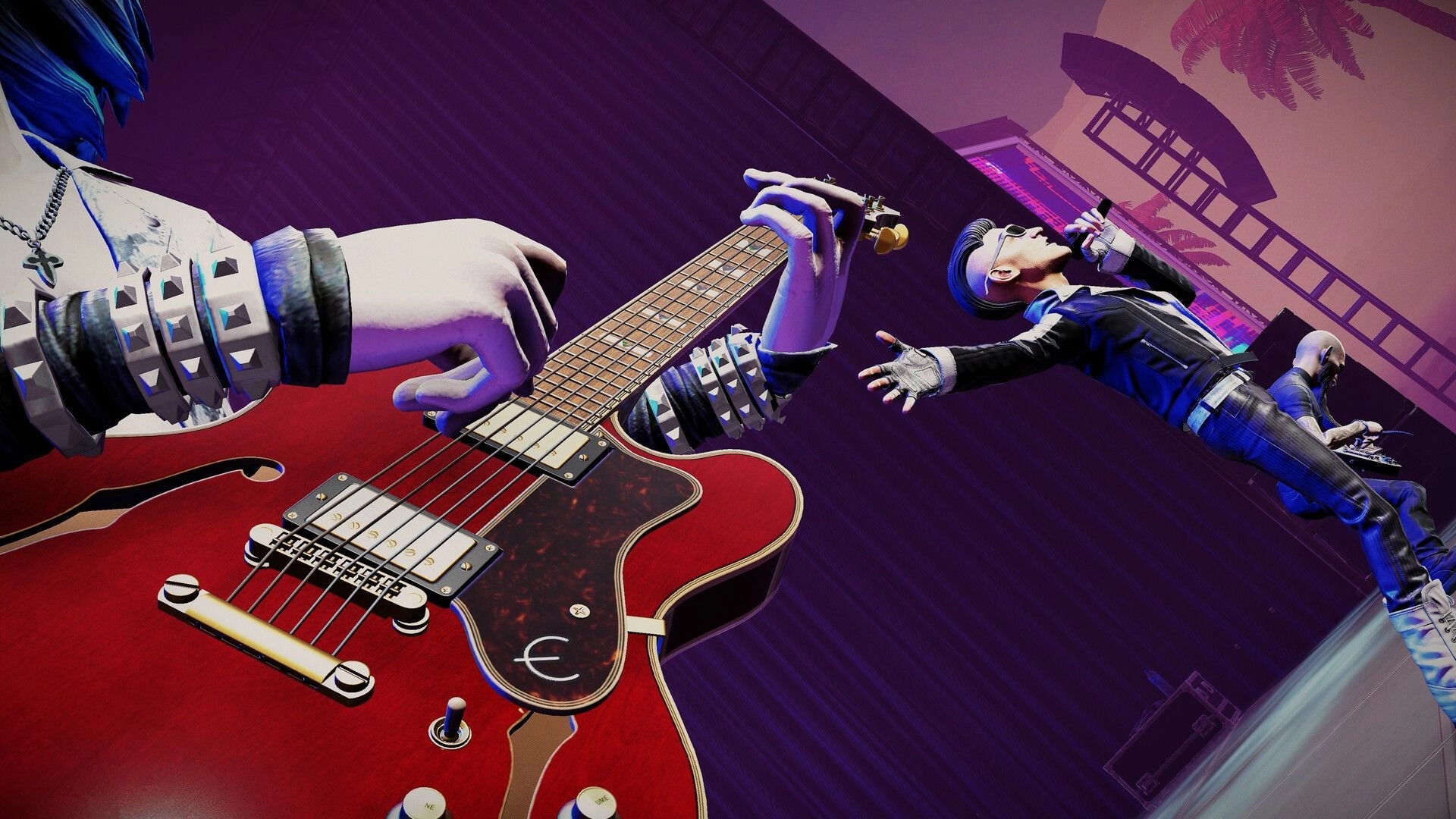 STAGE TOUR: Close-up of guitarist strumming red hollow-body guitar as singer leaps on neon stage lights.