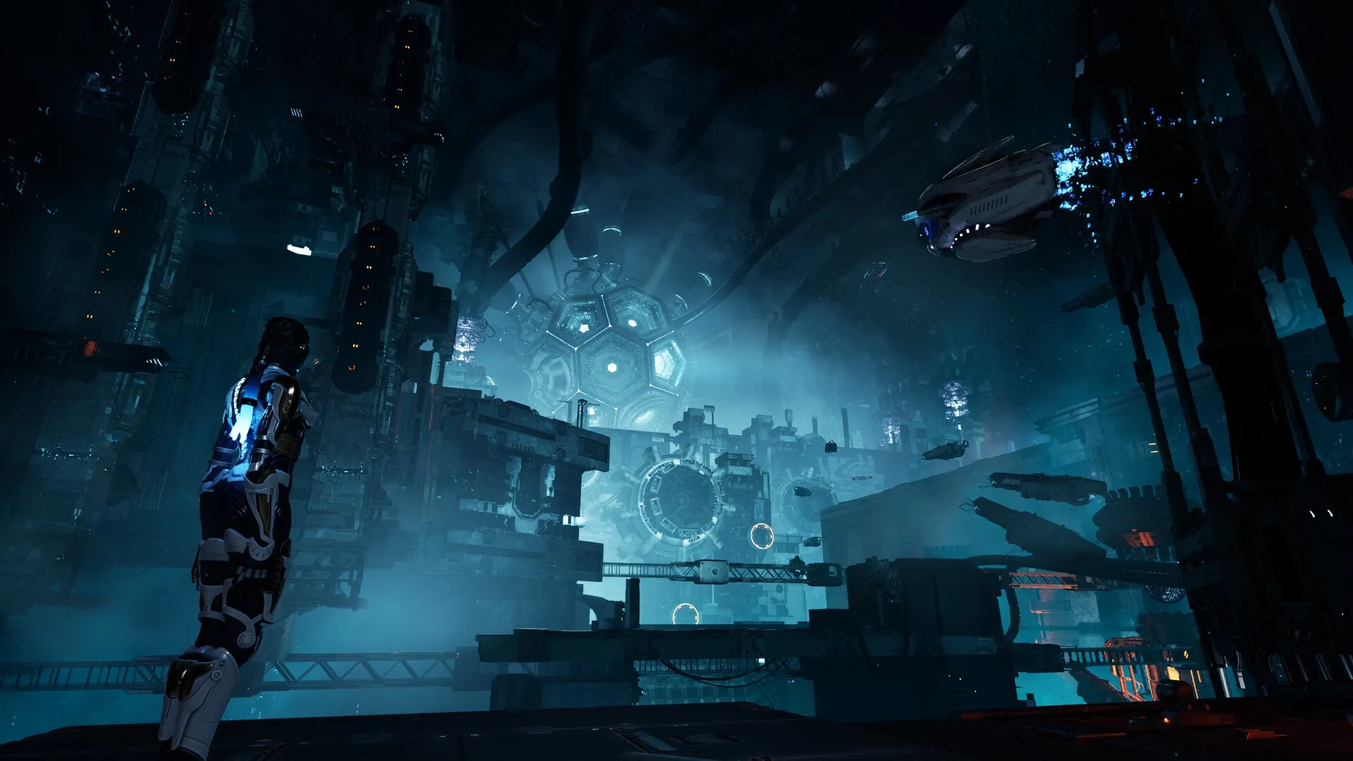 Steel Seed: Zoe stands in a massive, dimly lit underground facility, observing a distant drone.