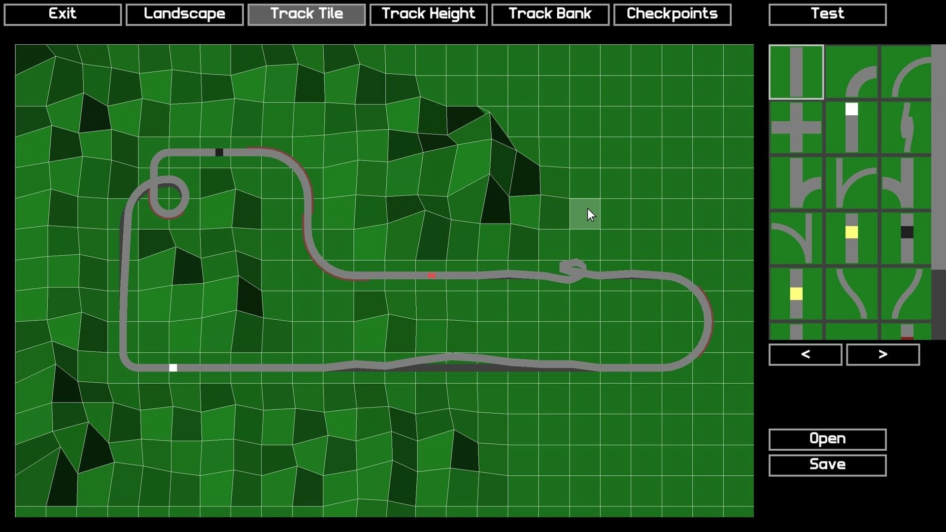 Stunt Derby: Track editor interface with grid layout and track tiles selection on green landscape background