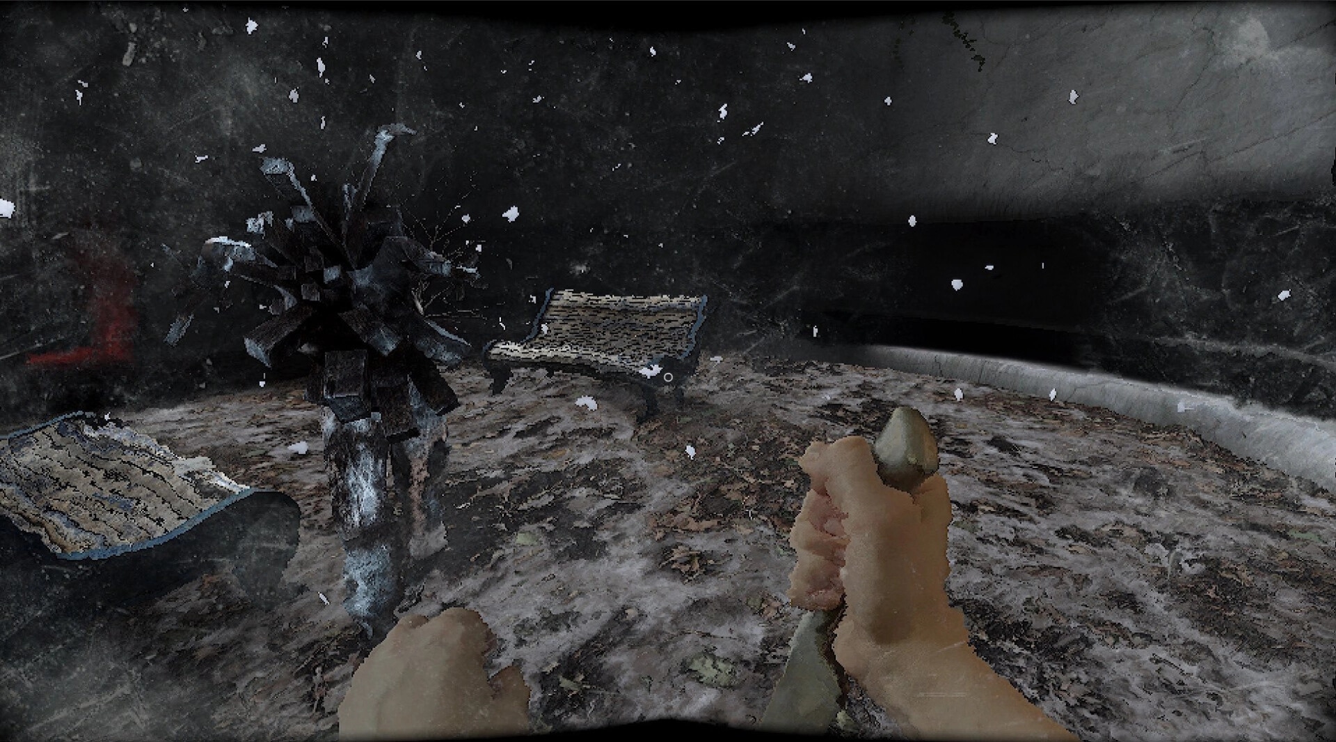 Subjectivation: First-person view holding a knife in a snowy park with benches and falling flakes.