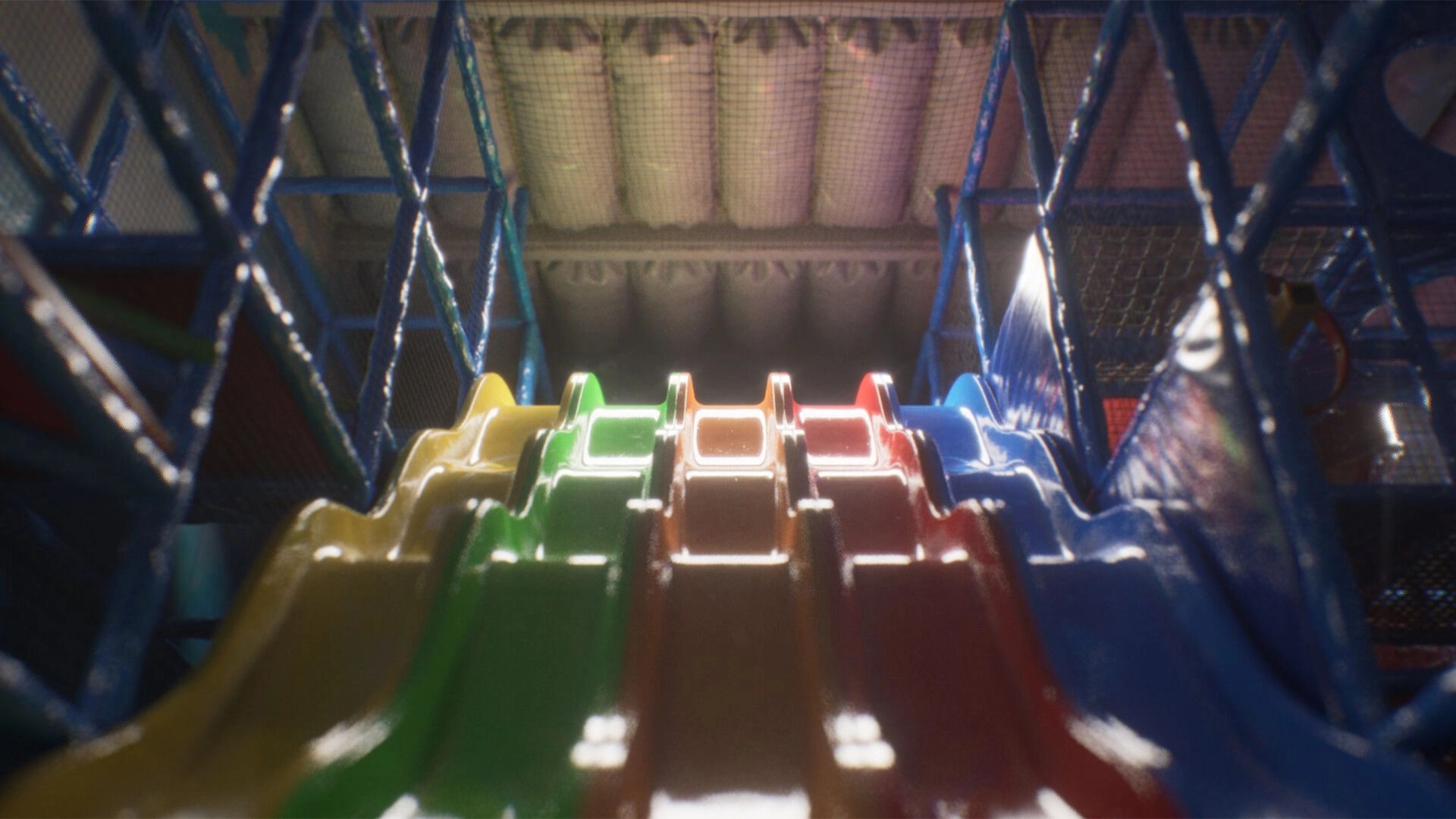 Subliminal: Colorful slide in a dimly lit indoor playground with metal frames and overhead pipes