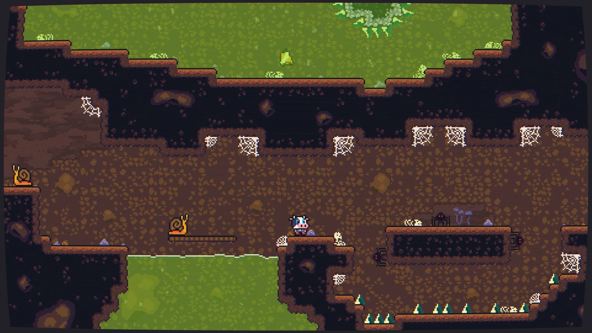 Super Beefit: Beefit stands on a ledge in a cavern with snails, webs, spikes, and green slime pools.
