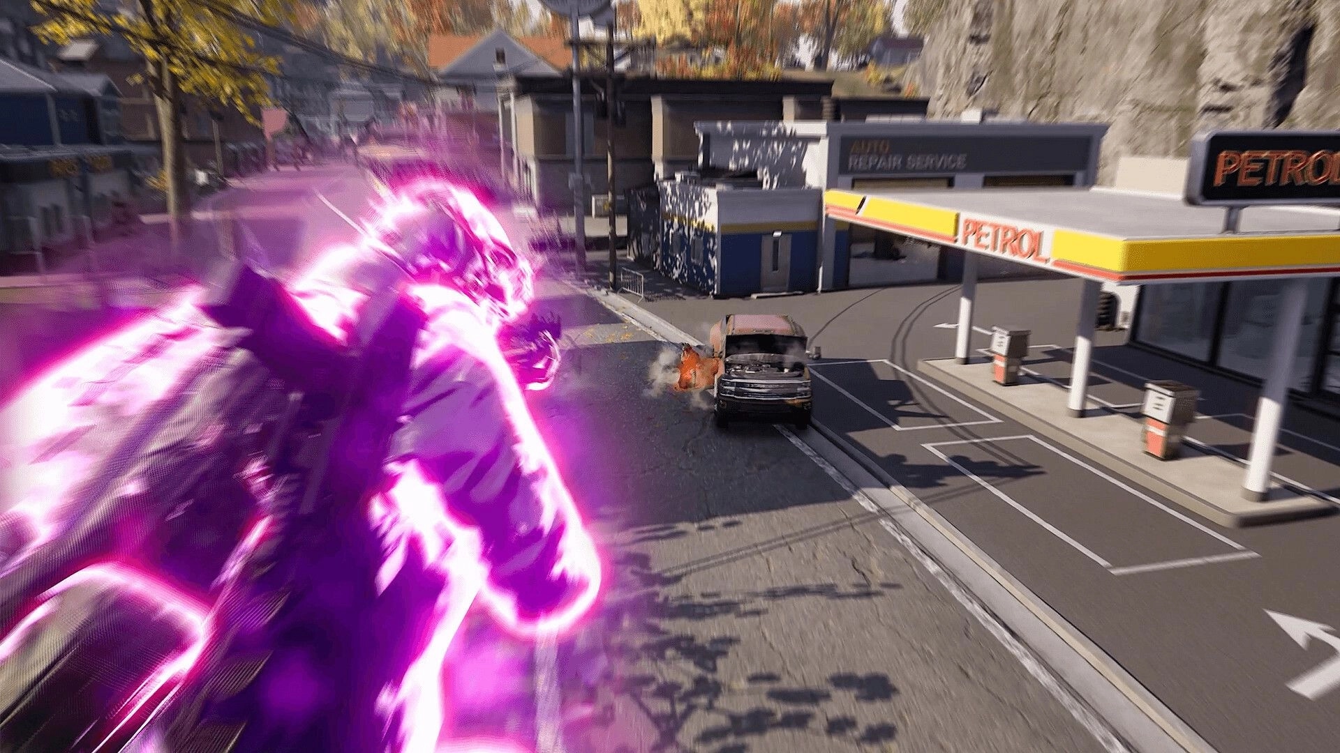 SUPER PEOPLE: Super-soldier with glowing aura leaps near petrol station, car emitting smoke and flames