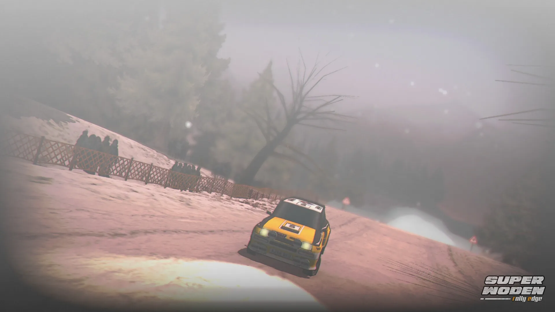 Super Woden: Yellow rally car speeding through snowy mountain road lined with sparse trees and fences