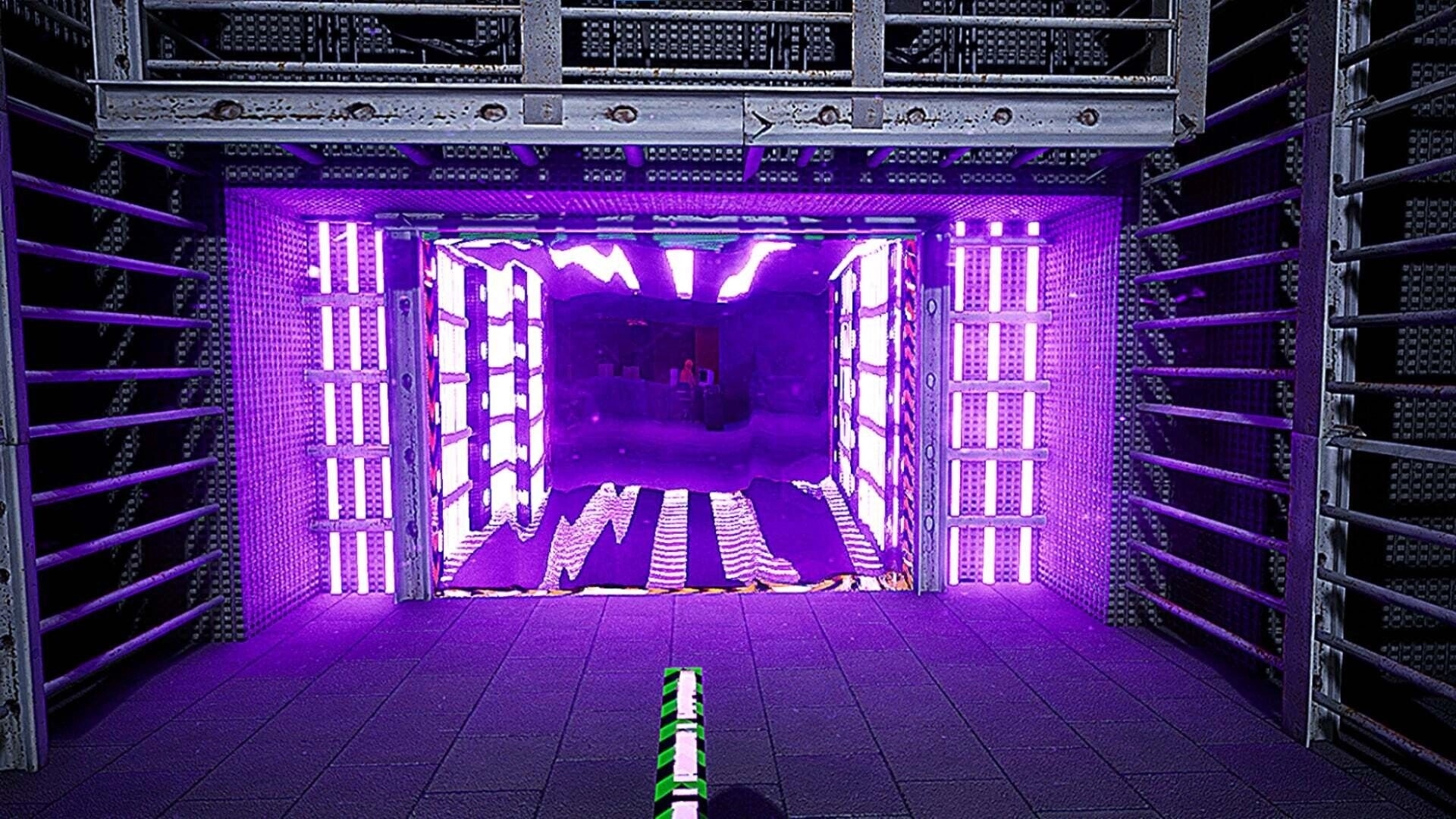 Tape 101: RC car navigates through neon-lit metal corridor in industrial environment