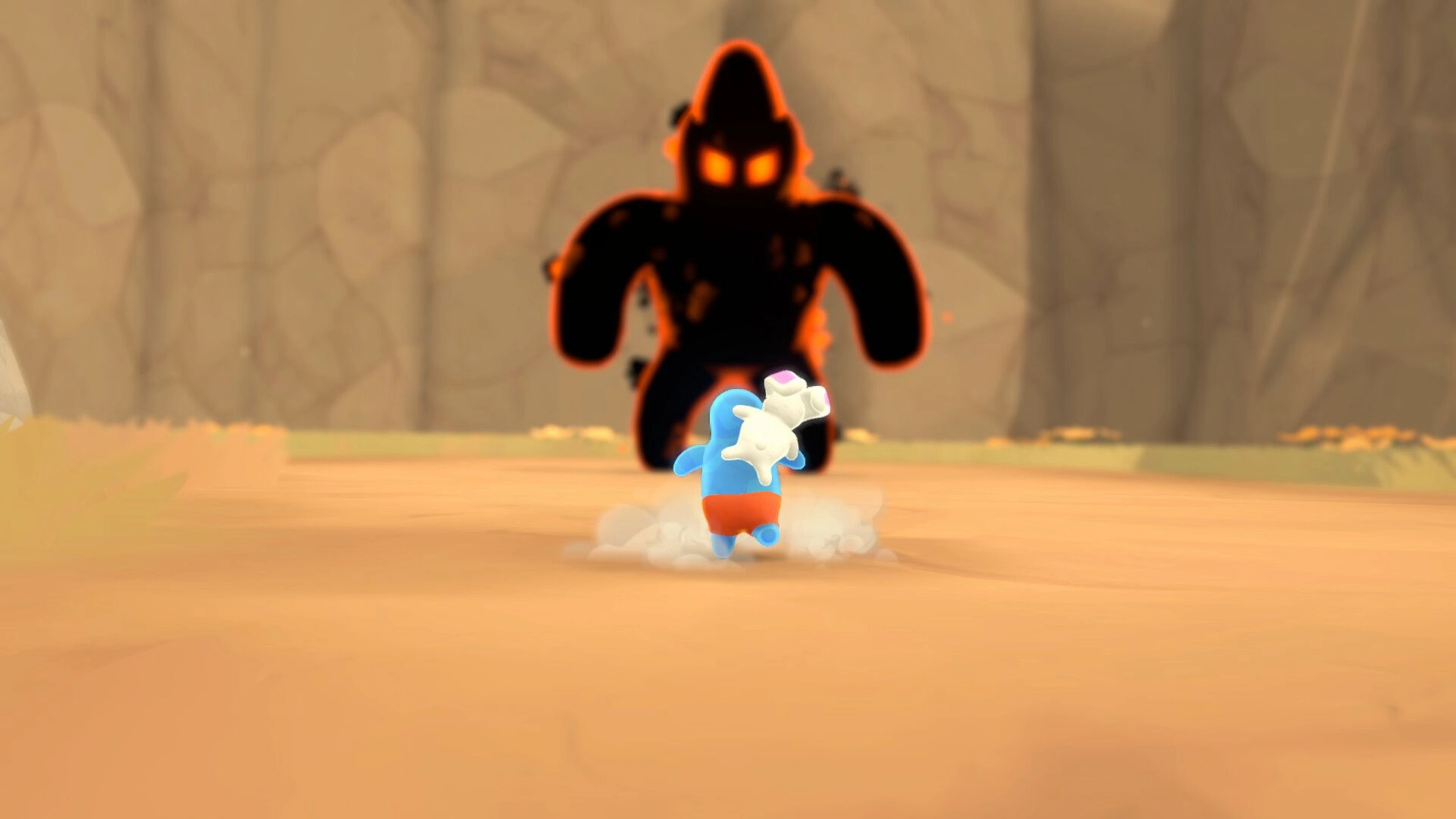 Teeto: Tiny blob and bunny duo flee from a shadowy monster in a sandy canyon environment.