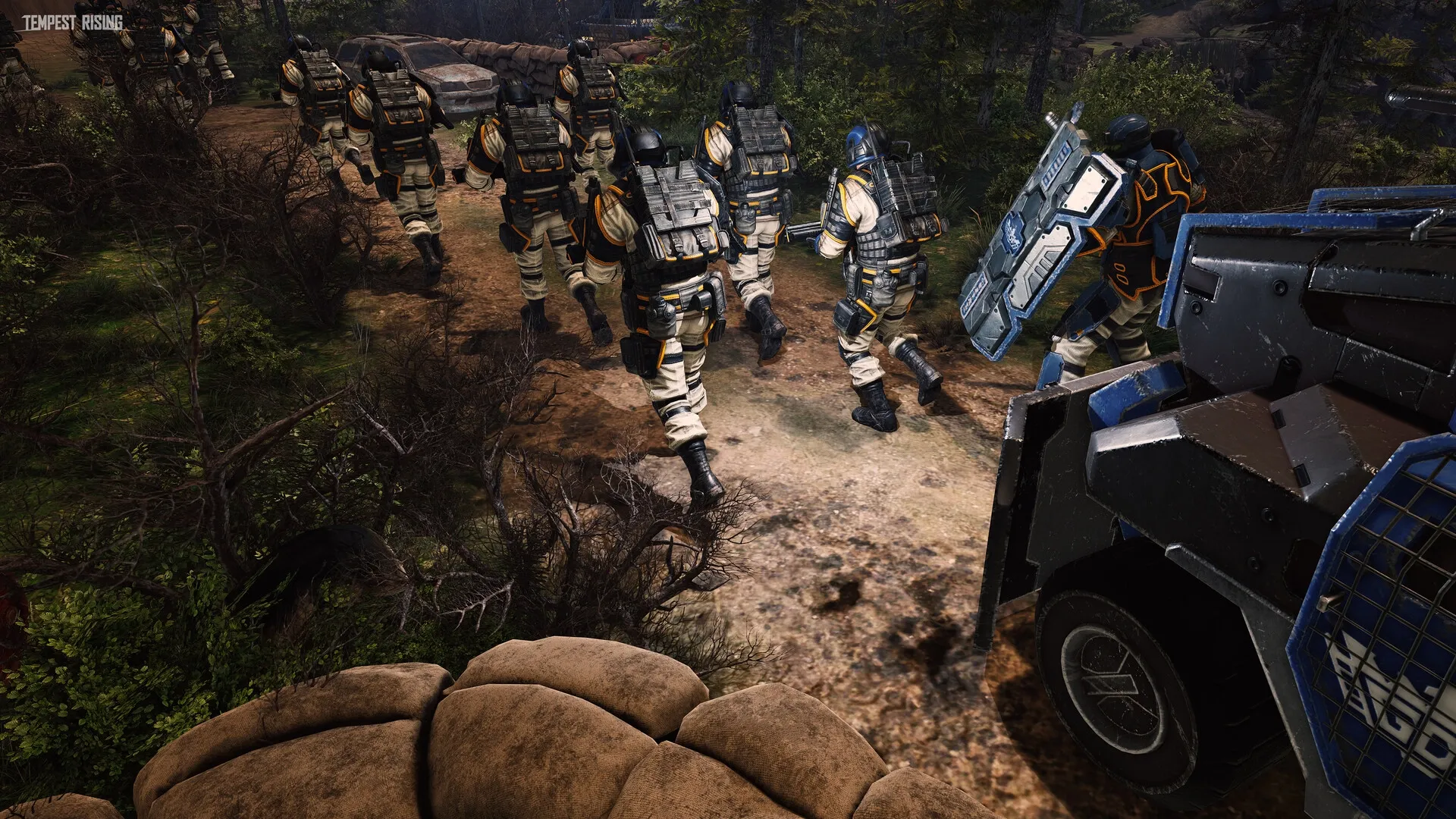 Tempest Rising: Soldiers march through a forest path beside armored vehicle on post-apocalyptic Earth