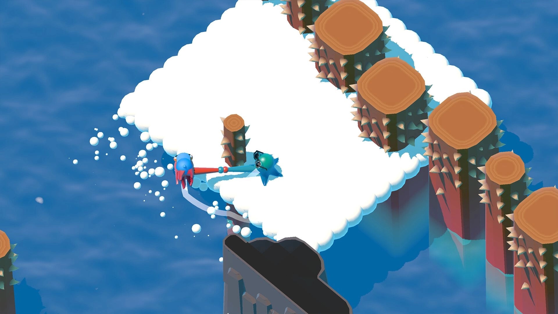 Tentacle Tango: Ten and Tango swing across snowy platforms avoiding spikes above blue water.