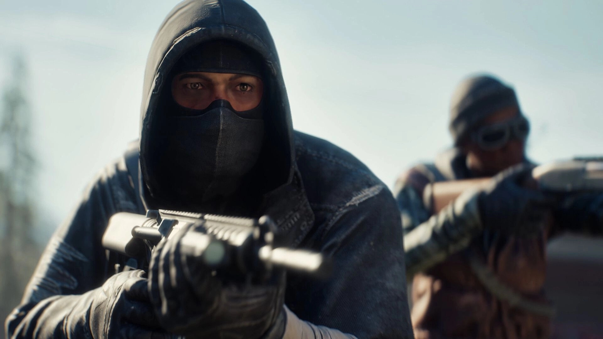 Terminator: Masked survivor aiming rifle beside armed ally in bright outdoor wasteland close-up.