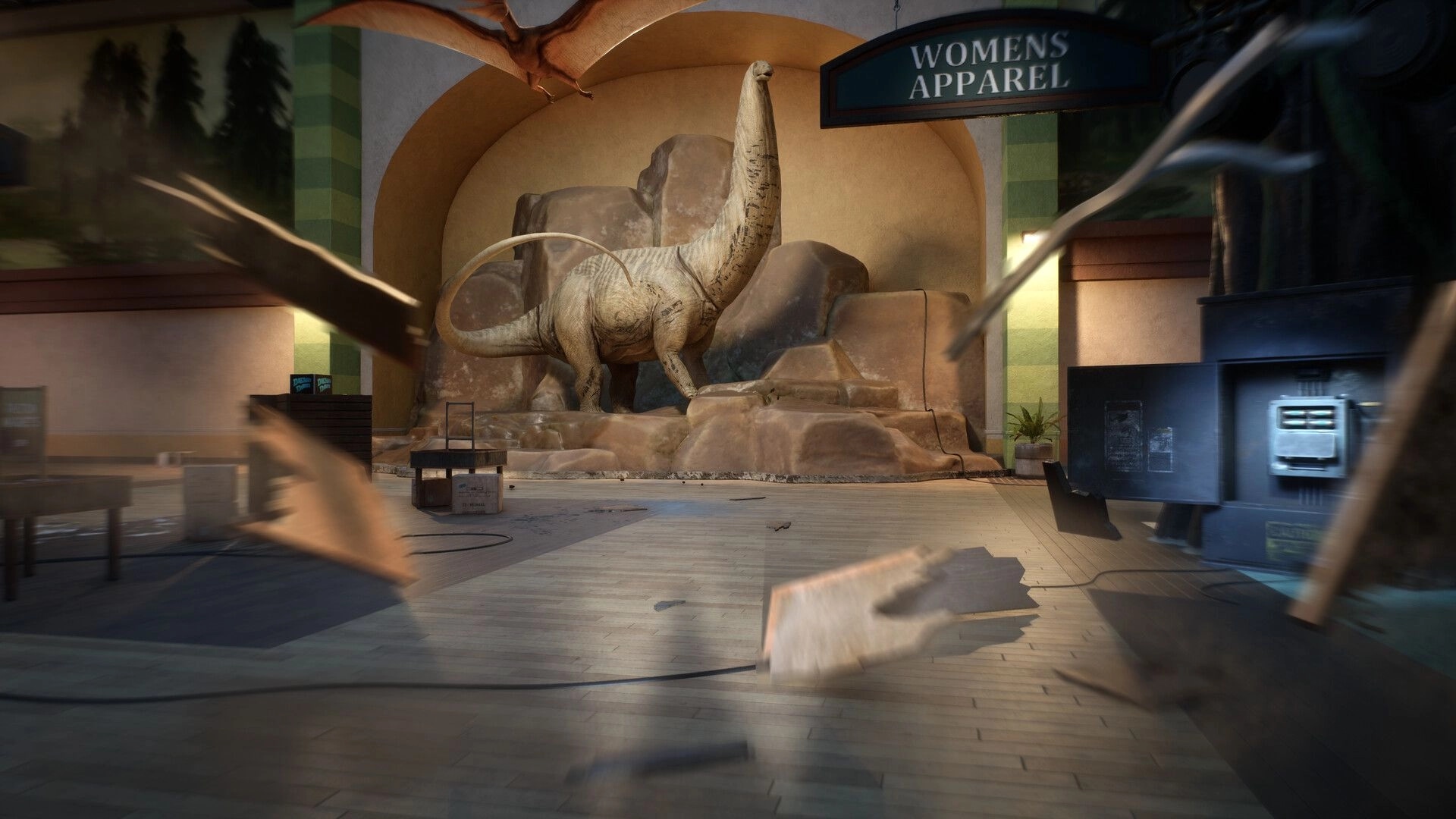 Terrible Lizards: Dusty mall atrium with a giant sauropod statue under a Womens Apparel sign.