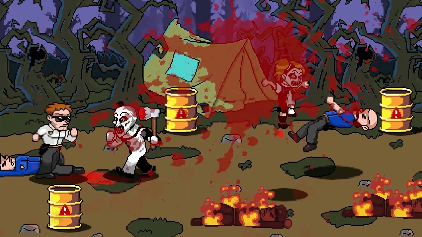 Terrifier: Art the Clown attacks in a bloody forest campsite with barrels and a burning campfire.
