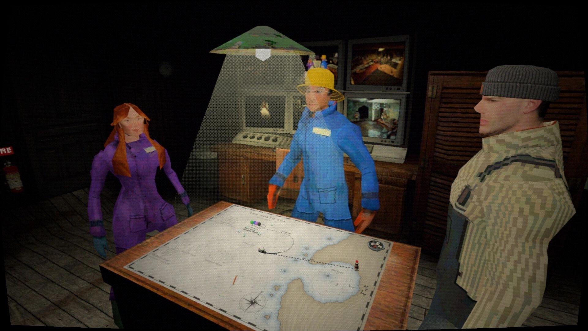 Thalassomania: Three crew members gather over a sea chart in the ship cabin with CCTV monitors lit.