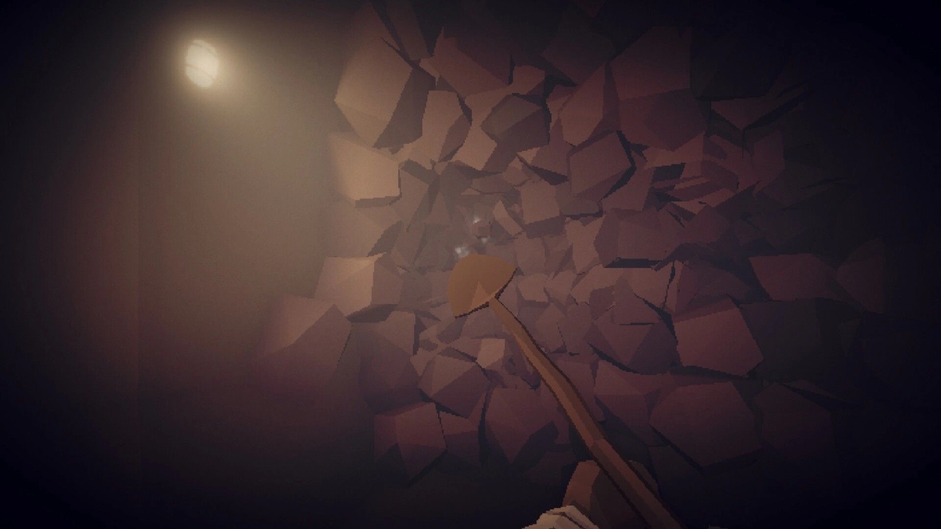 The Atrium: First-person pickaxe mining cracked rock wall in a dim, dusty cave lit by a lamp glow.