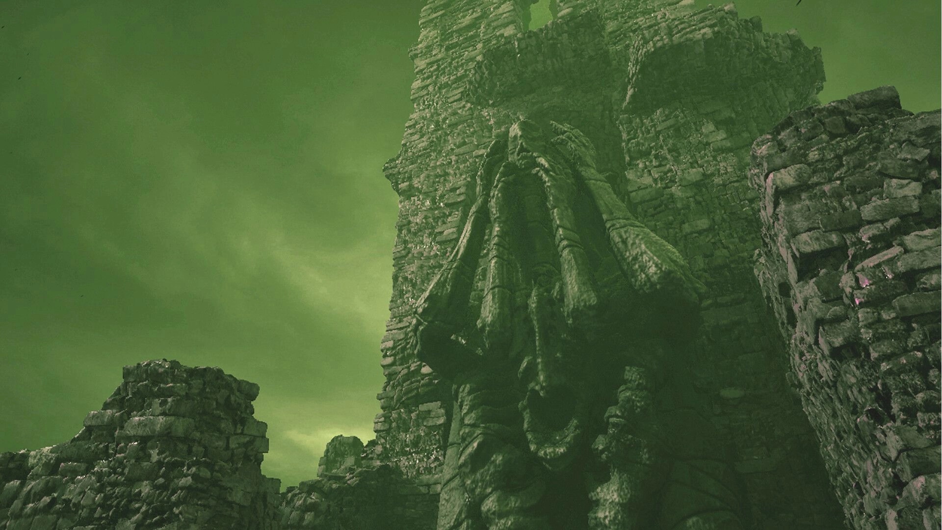 THE BACKWORLDS: Towering stone ruins against a green sky with eerie, ancient statue figures visible