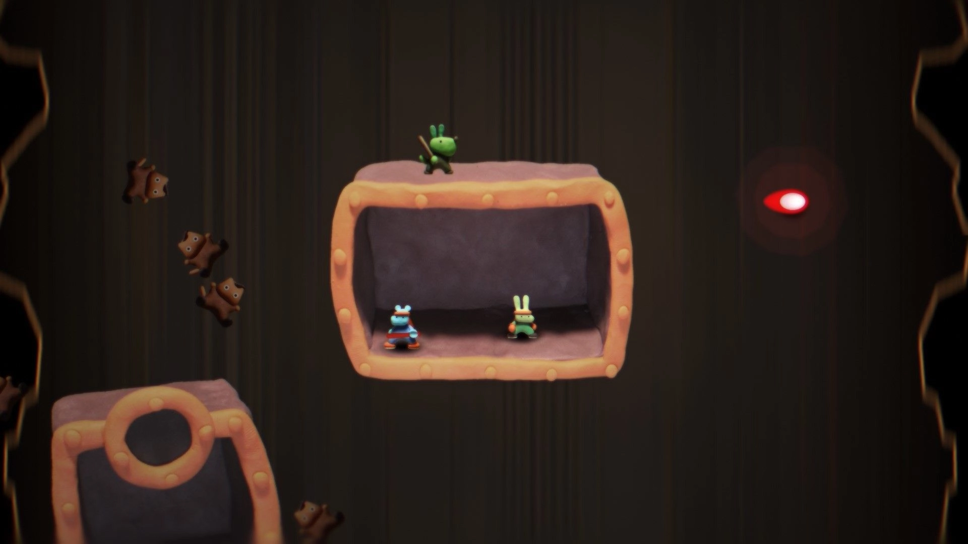 The Ballad of Bonky: Bonky and Puncho in cave with red eye and falling teddy bear enemies