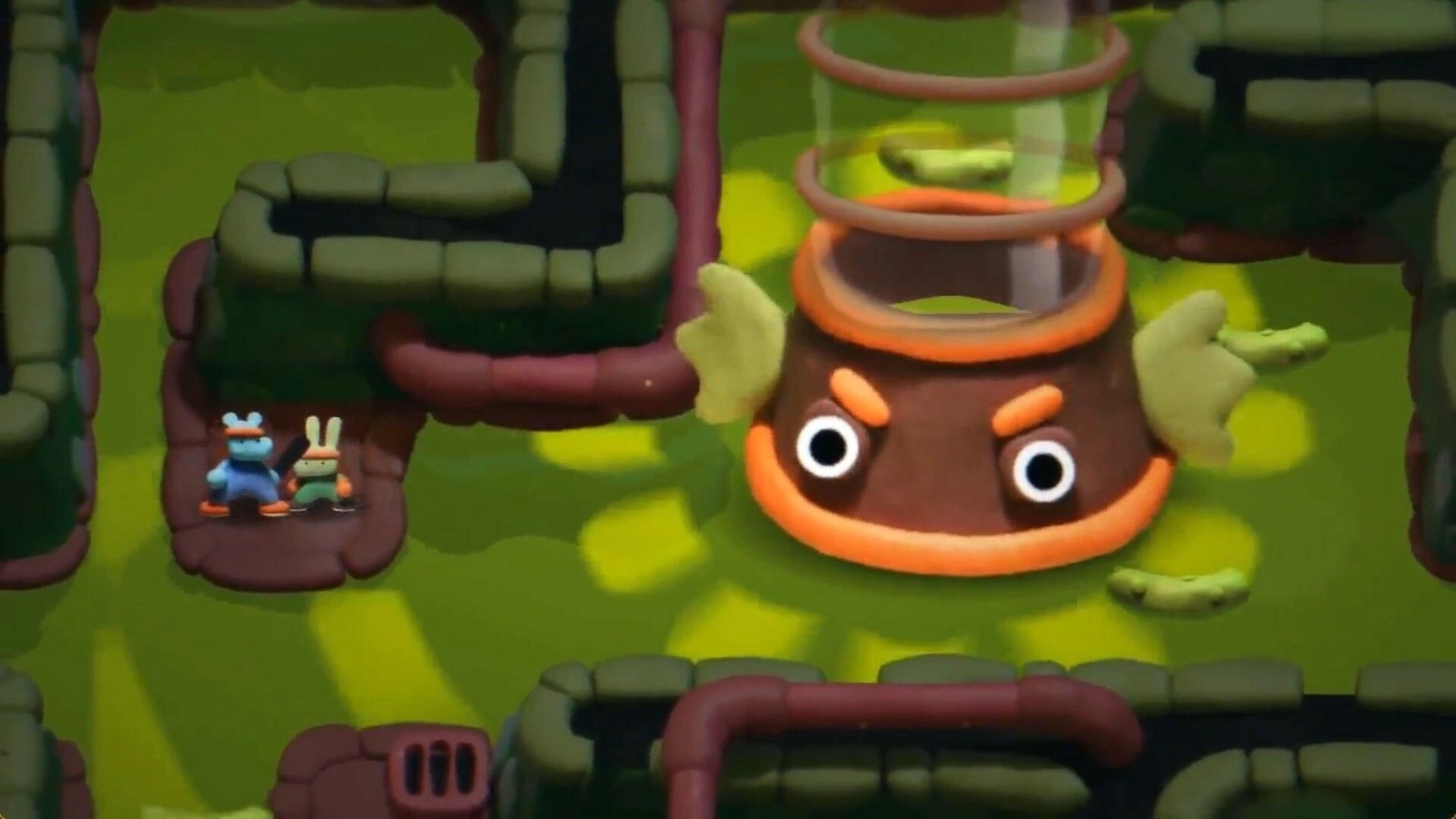 The Ballad of Bonky: Bonky and Puncho navigate a clay maze with a large, animated fish-shaped enemy.