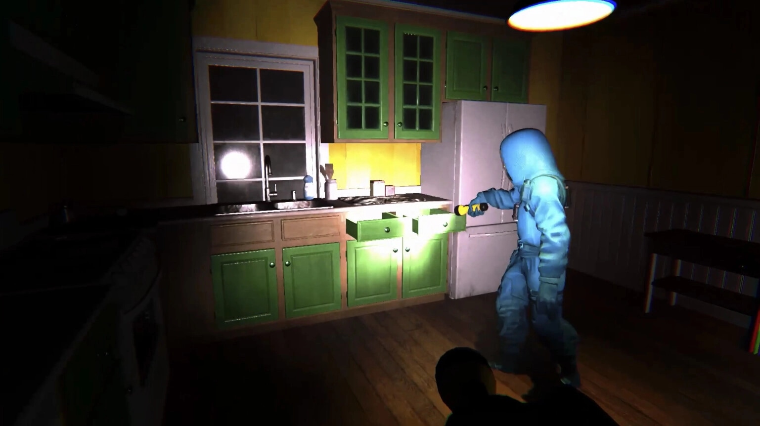 The Doorway Effect: Character in hazmat suit searches kitchen drawers with flashlight in dimly lit room