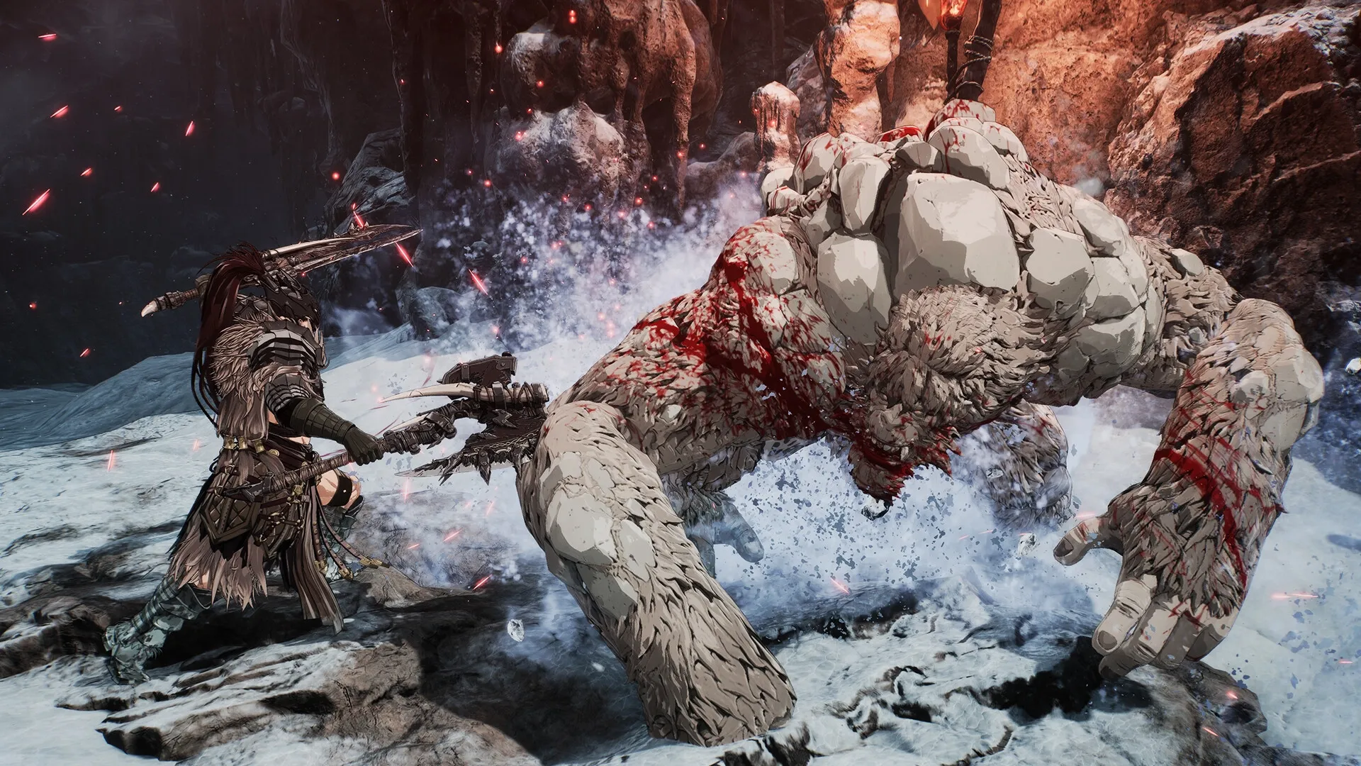 The First Berserker: Khazan battles a massive stone creature in a snowy cavern environment.