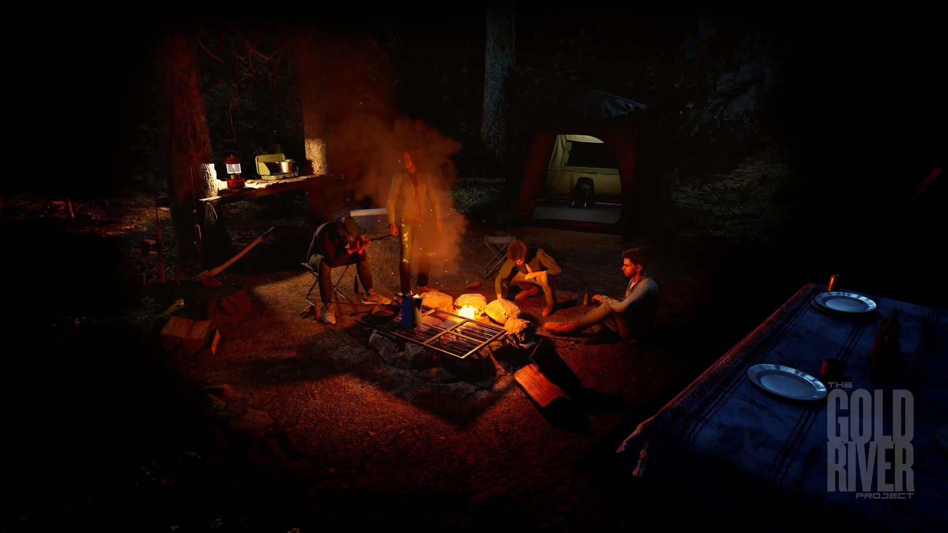 The Gold River Project: Four campers gather around a fire at night with a tent and supplies in the forest.