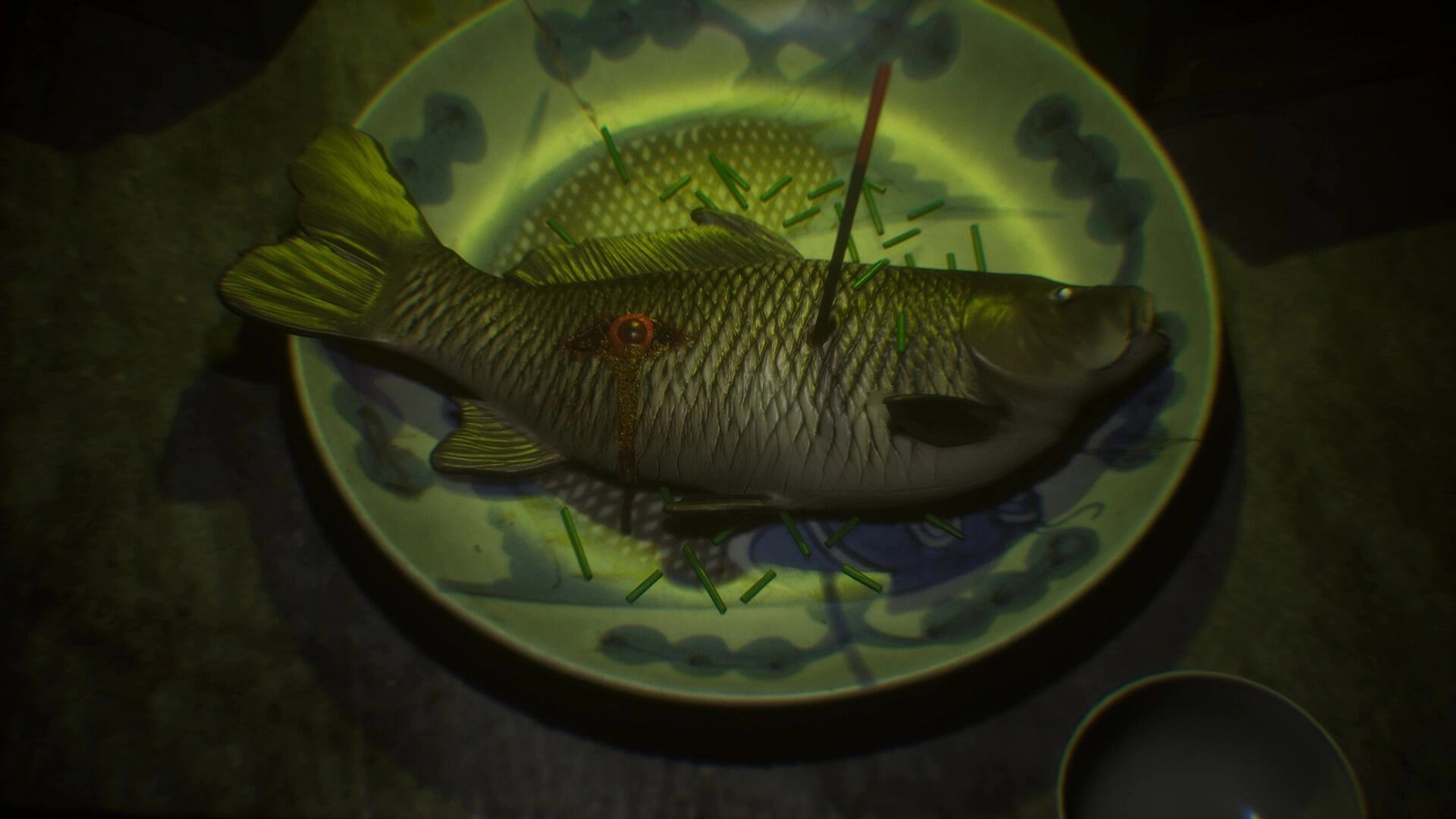 The Grotto Diary: Close-up of a fish on a patterned plate with chopsticks, dimly lit table scene.