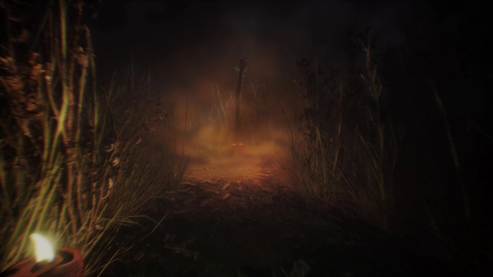 The Grotto Diary: First-person view holding a candle on a foggy path through tall grass at night.