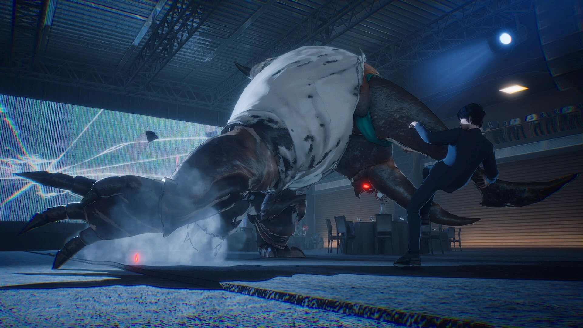 The Internal: Office worker dodges a hulking clawed monster inside a dim warehouse with tables and lights.