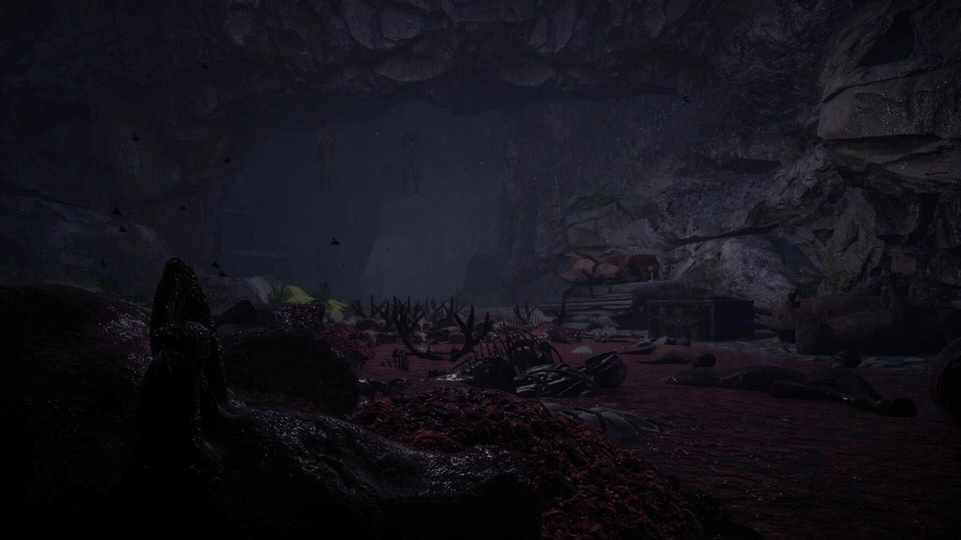 The Midnighters: Dark cave interior filled with skeletal remains and ominous shadows scattered around
