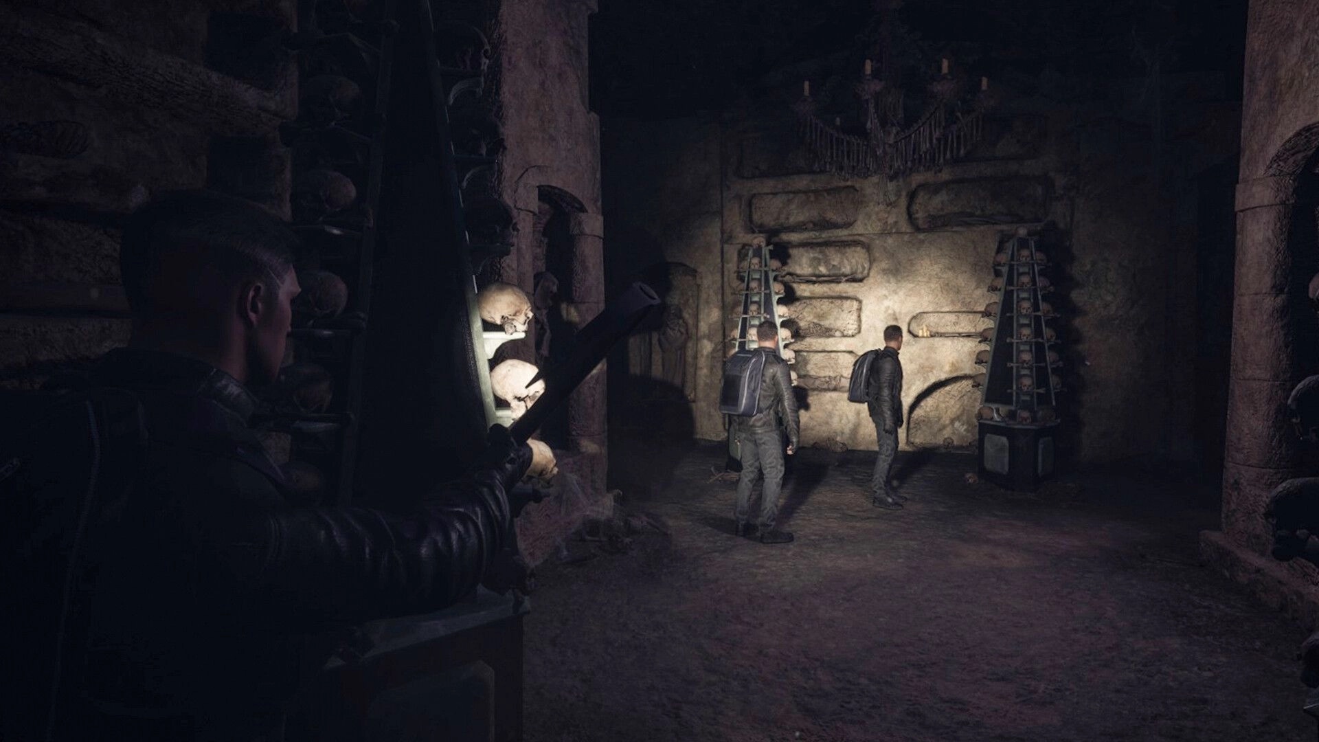 The Midnighters: Characters exploring a dimly lit crypt filled with skulls and mysterious artifacts