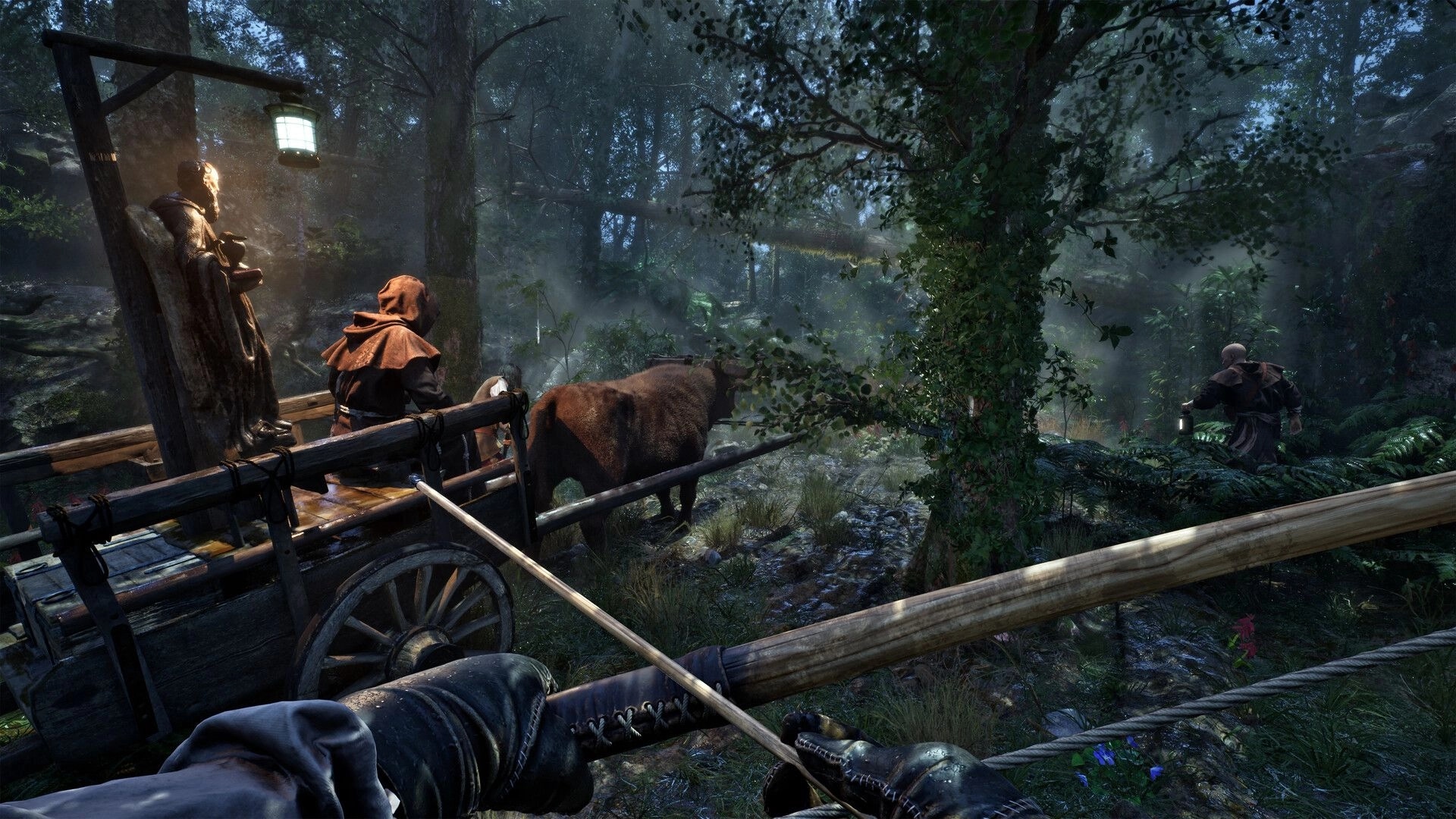 The Mound: First-person view with drawn bow beside a cart and ox in a misty jungle camp at night.