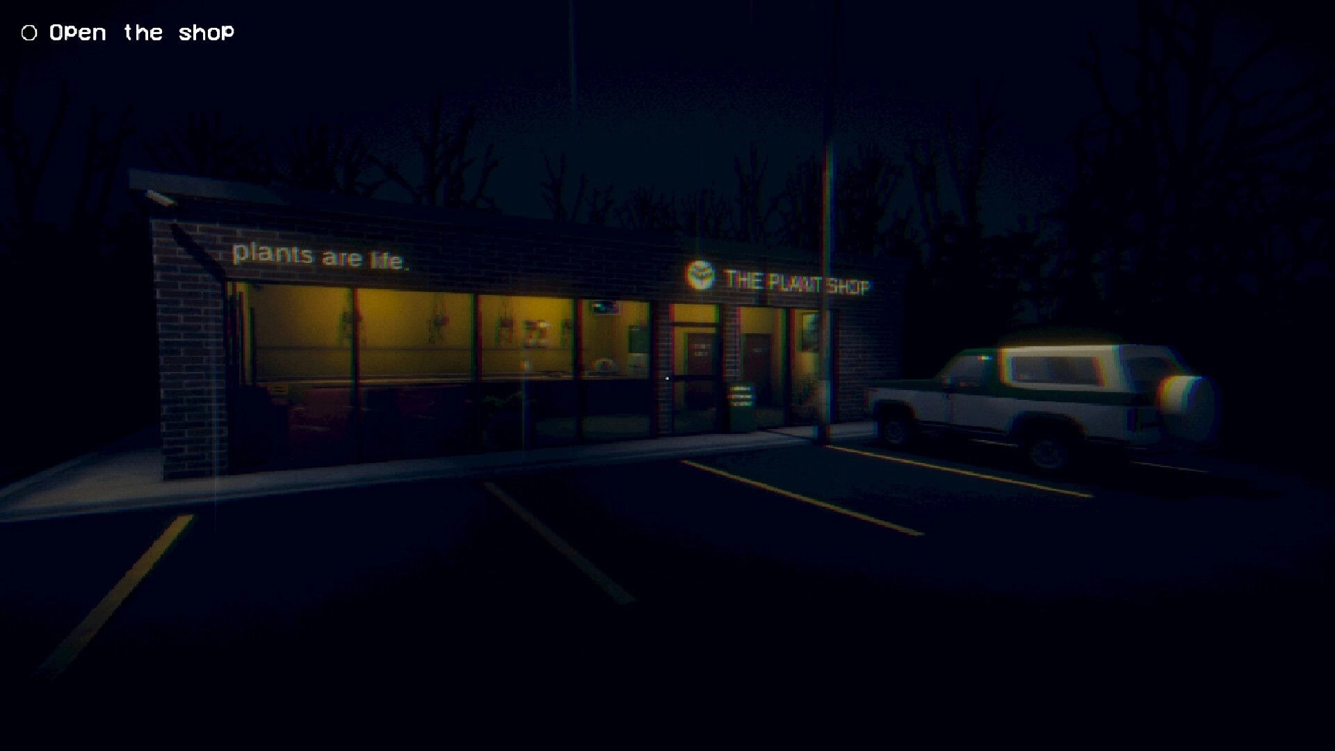 The Plant Shop: Exterior view of shop at night with car parked outside and neon sign glowing