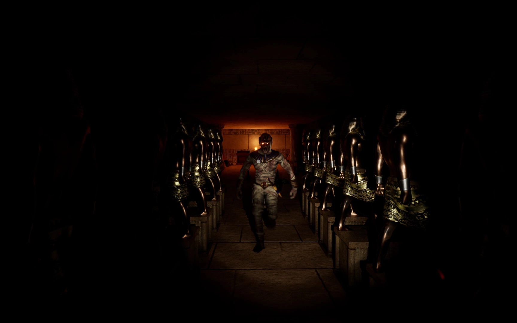 The Third: A mummy emerges from shadows in a narrow corridor lined with ancient statues