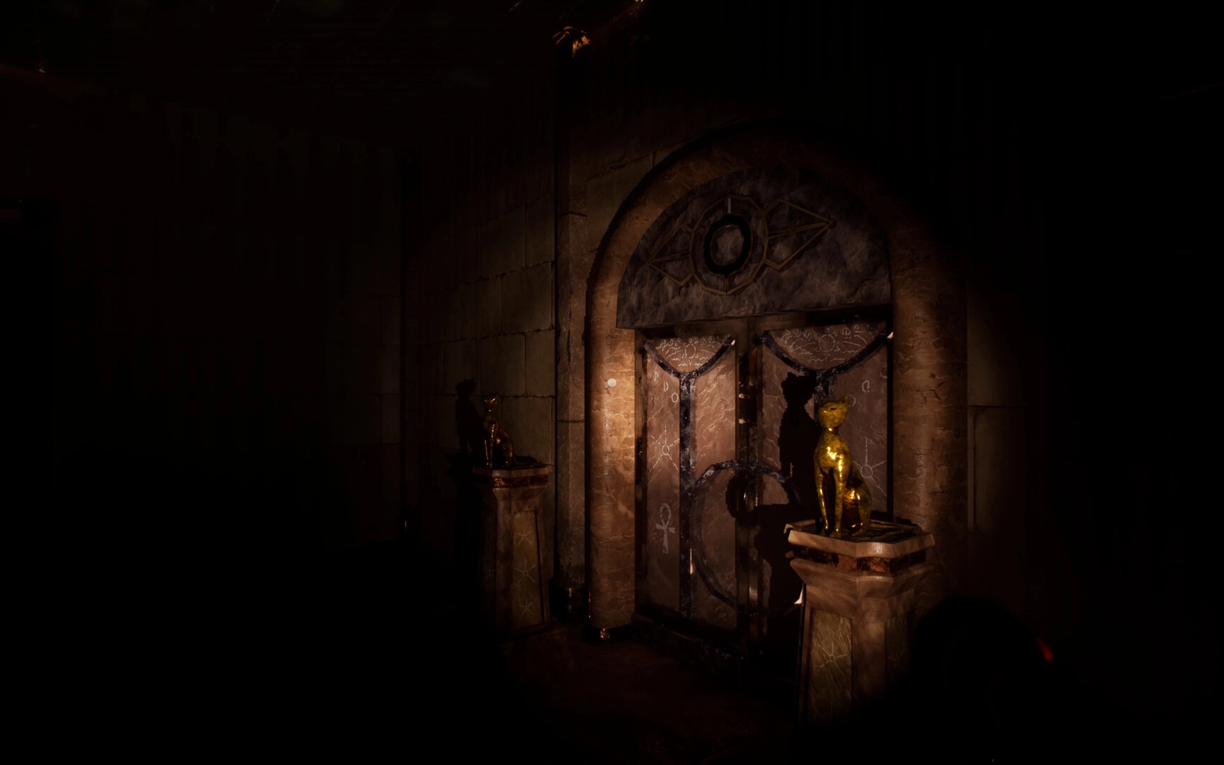 The Third: Dimly lit temple entrance with ornate door and golden cat statues on pedestals