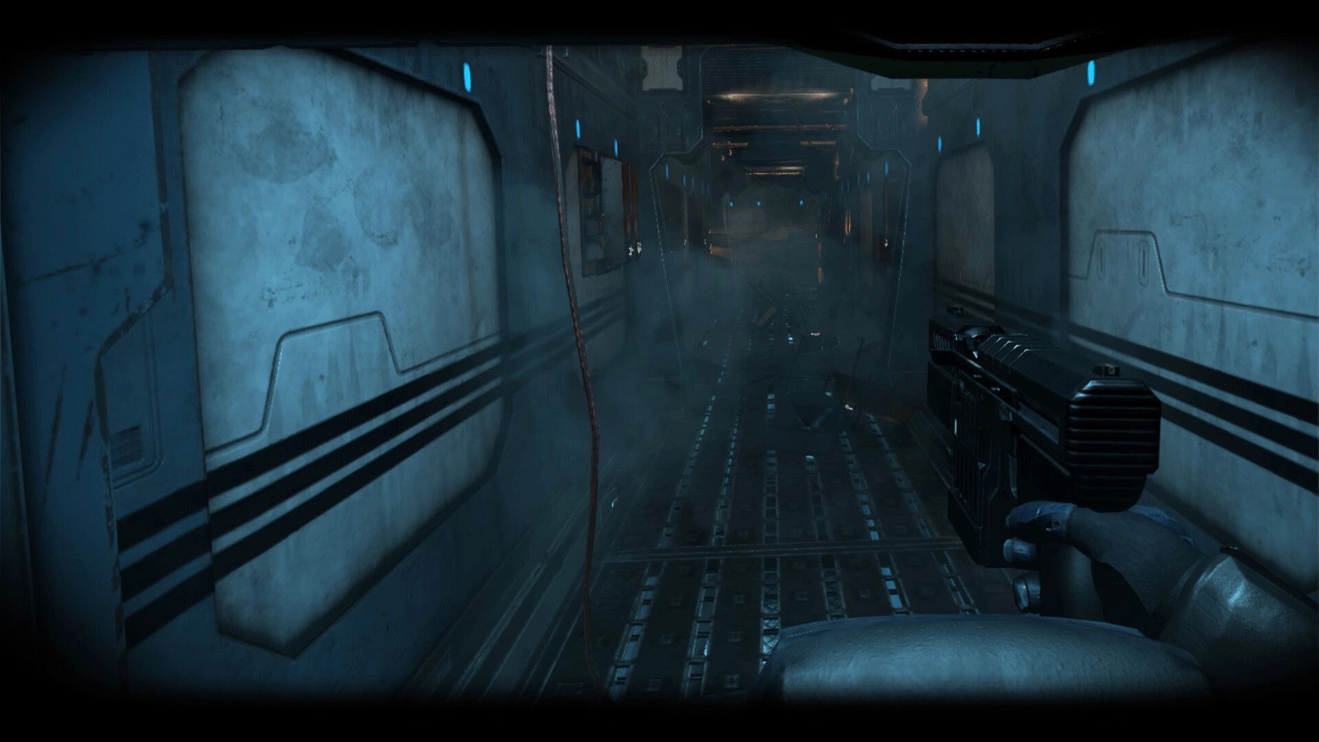 The Warp: Player holding a gun exploring a dim, fog-filled corridor aboard the Cephisso spaceship