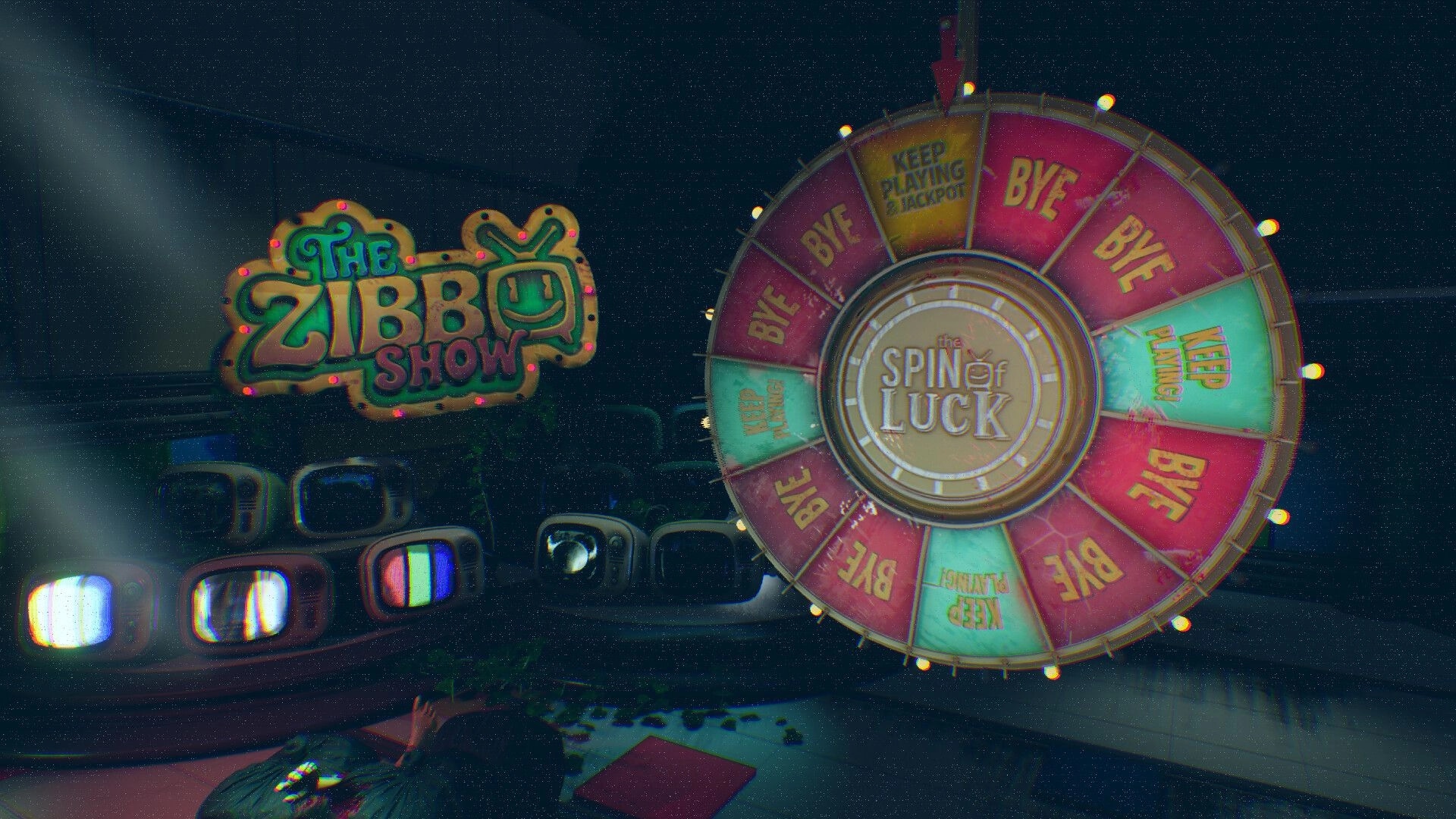 The Zibbo Show: Spin of Luck prize wheel with BYE and KEEP PLAYING wedges on a TV studio set.