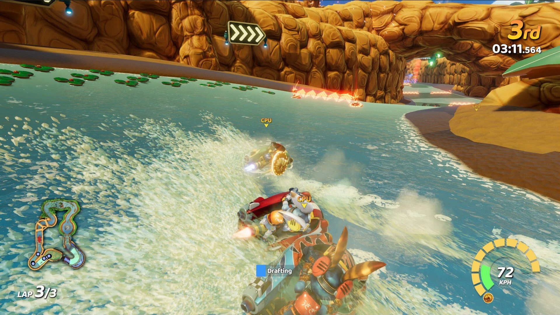 Tidal Rush: HydroSpeeder racing through canyon waters, player drafting behind CPU opponent, lap 3/3
