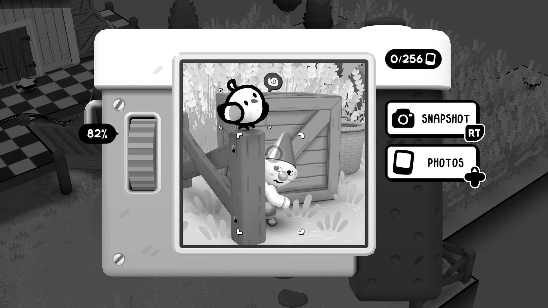 TOEM 2: Camera view aiming at a bird on a fence post by a crate, Snapshot/Photos UI open.