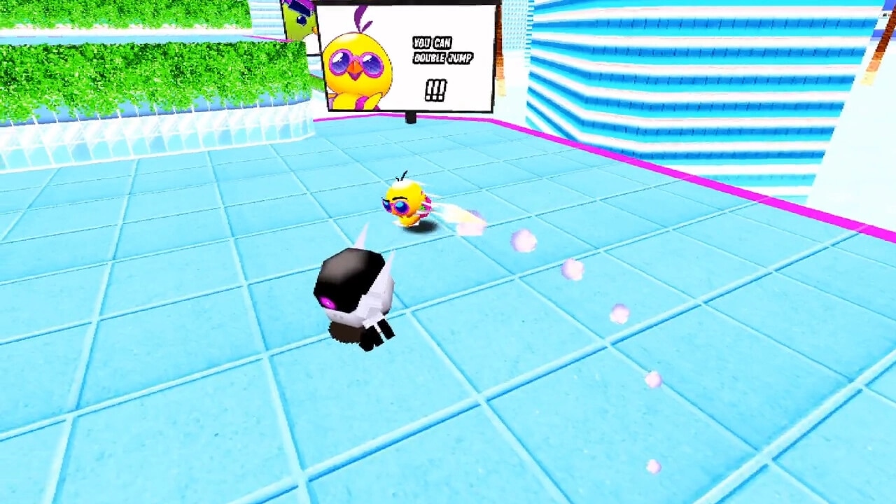 Toree Saturn: Toree double jumping near a robot on a bright blue platform with a tutorial sign.