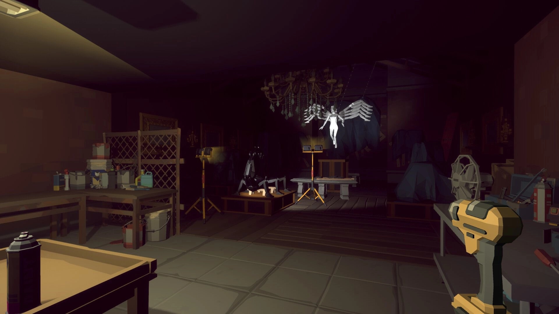 TOYCRAFTER: Workshop with scattered tools and an eerie angelic figure suspended in dimly lit room.