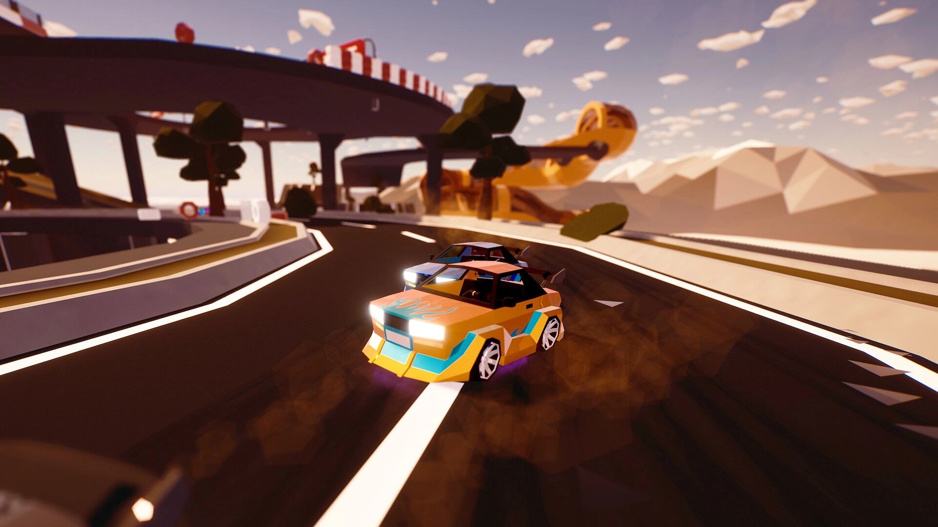 Traks: Two colorful race cars drift through a banked highway curve under overpasses at sunset.