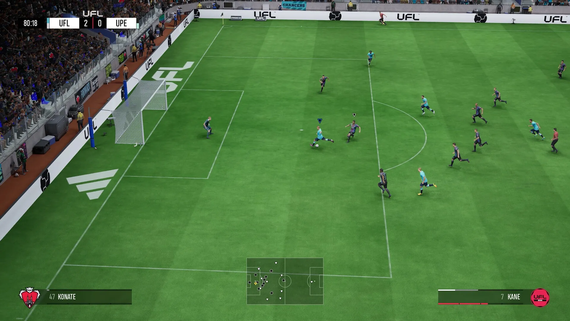 UFL™: Player Kane taking a shot on goal in a crowded stadium with scoreboard showing 2-0 score.