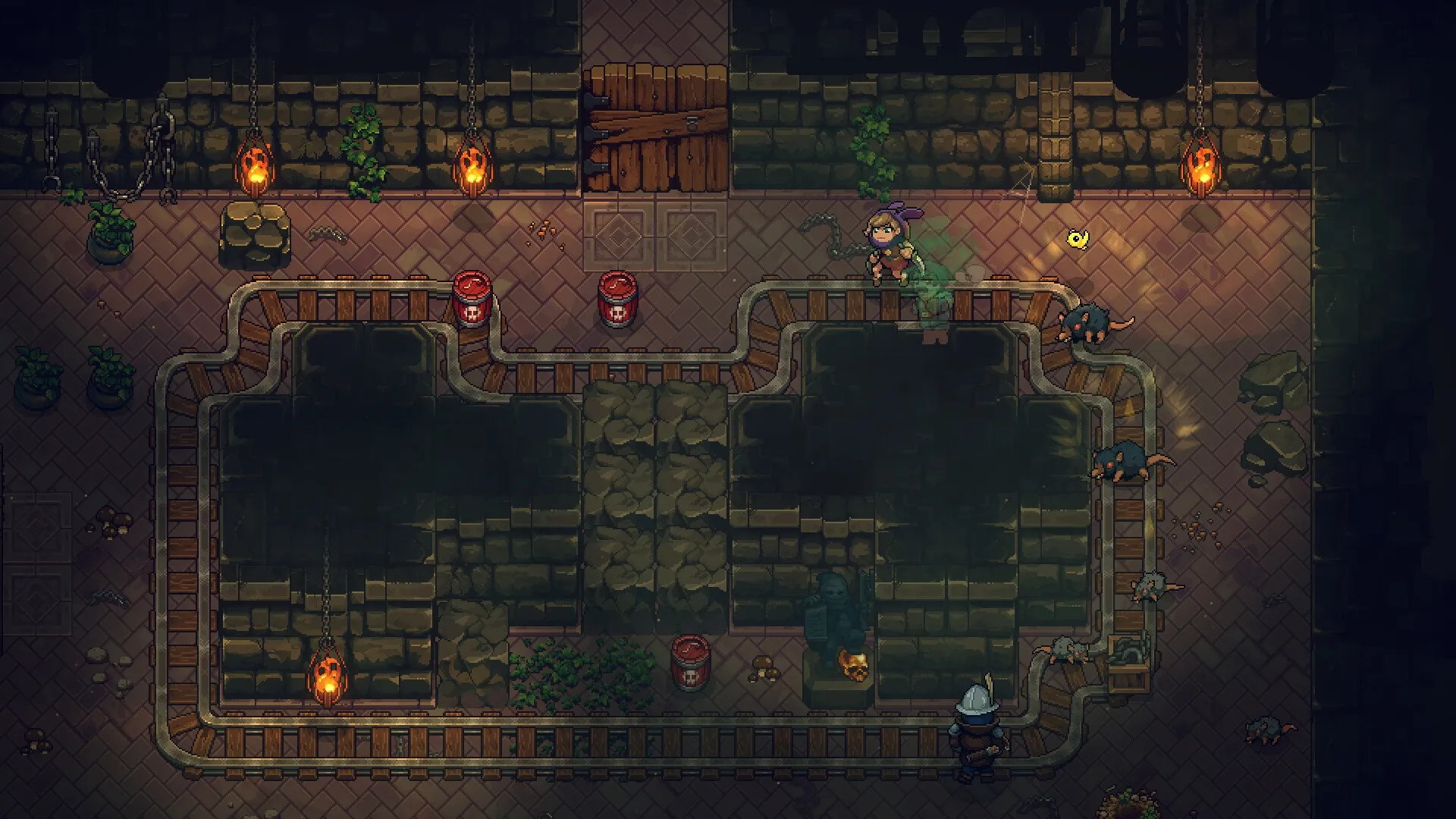 UnderMine 2: Character exploring dungeon with rats and explosive barrels in an underground passageway