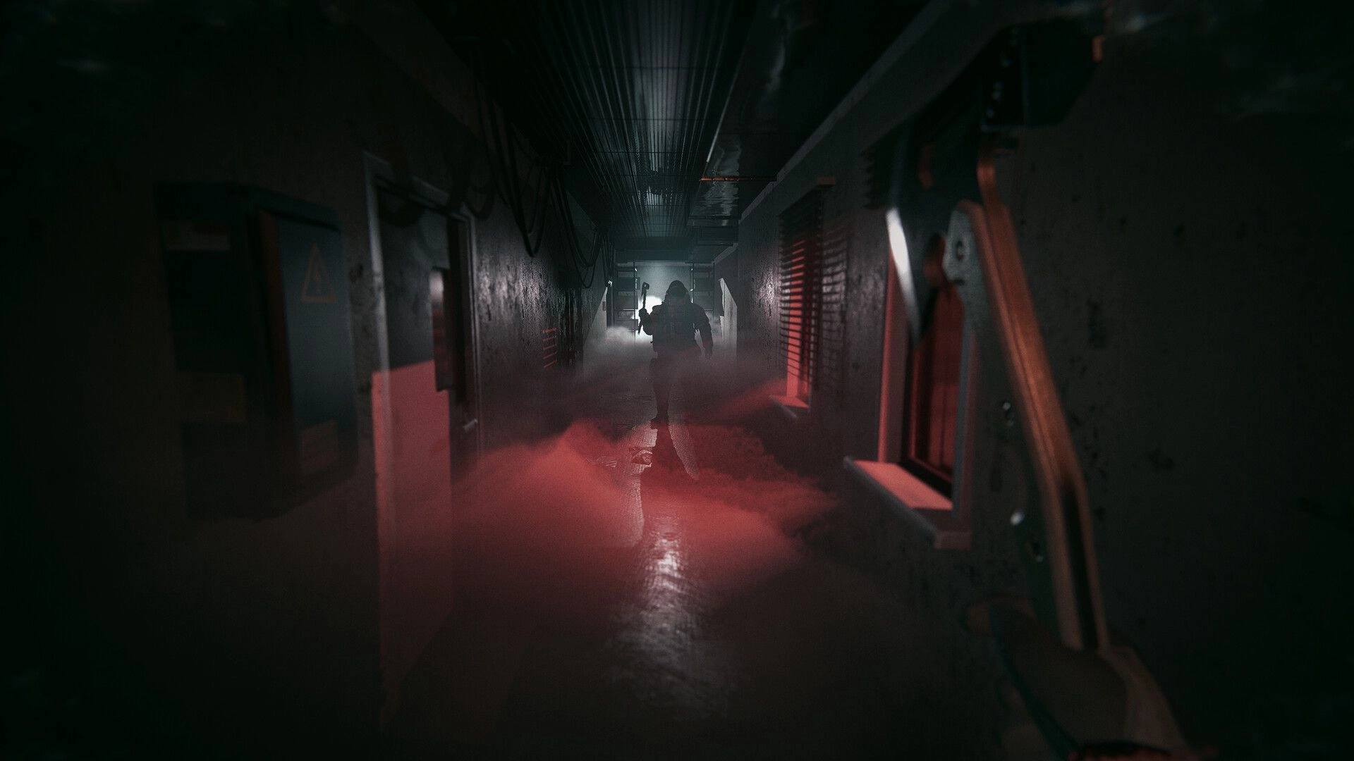 UNFROST: Armed teammate advances through a dim metal corridor with red smoke and harsh backlight.