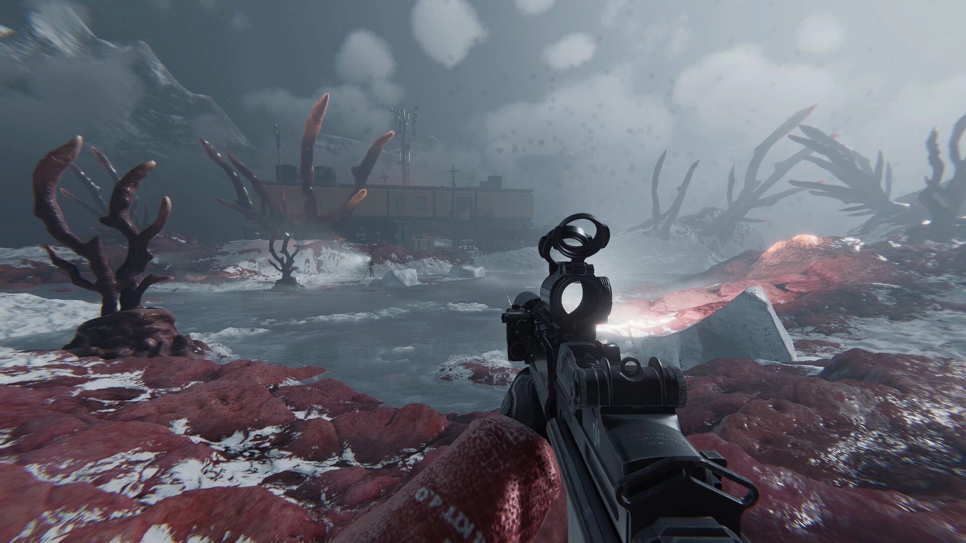 UNFROST: First-person rifle aiming across icy water at a base, red alien growths in blizzard haze.
