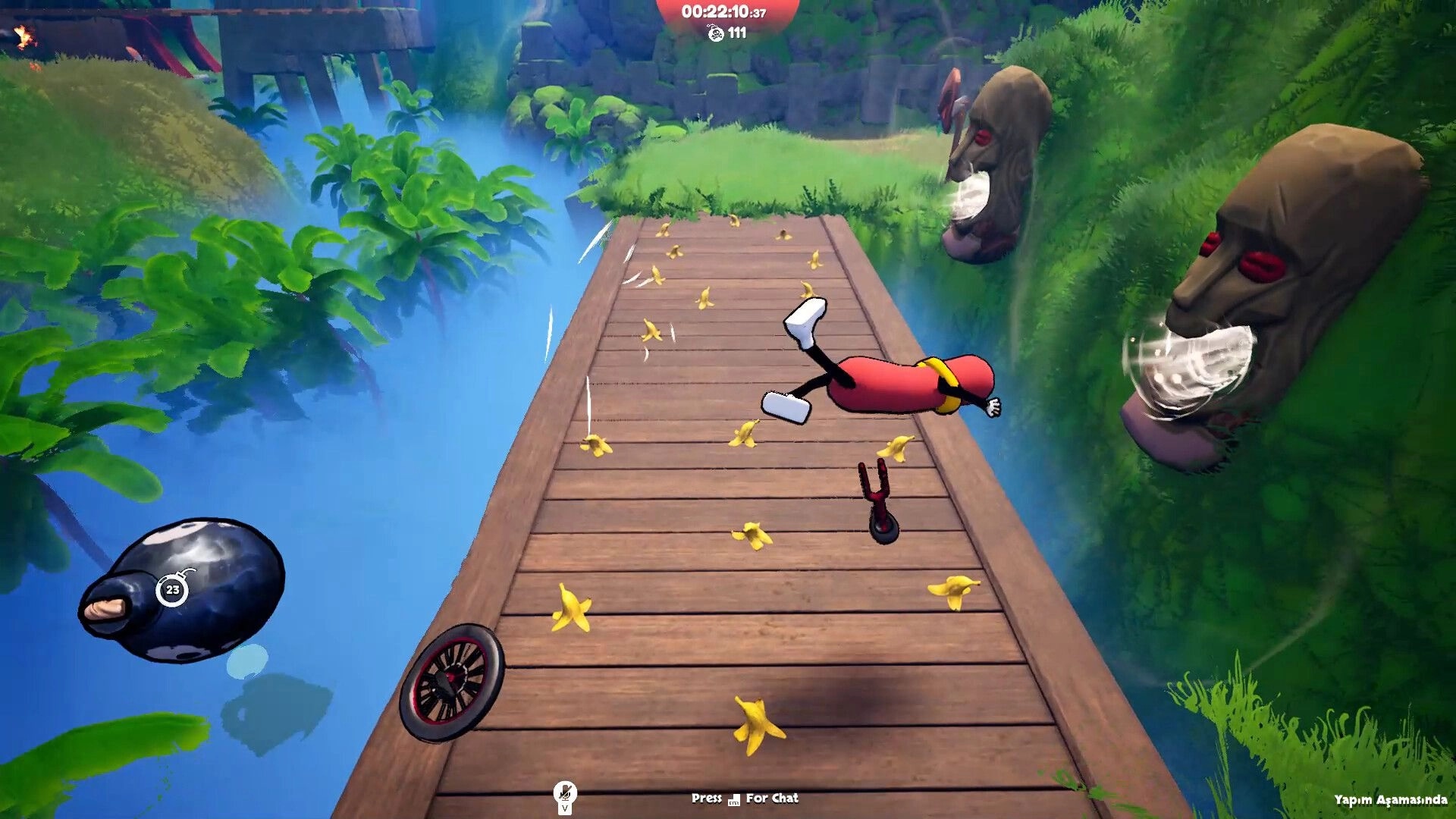 Unicycle Together: Sausage rider sprawled on banana peels on a wooden bridge over jungle river.