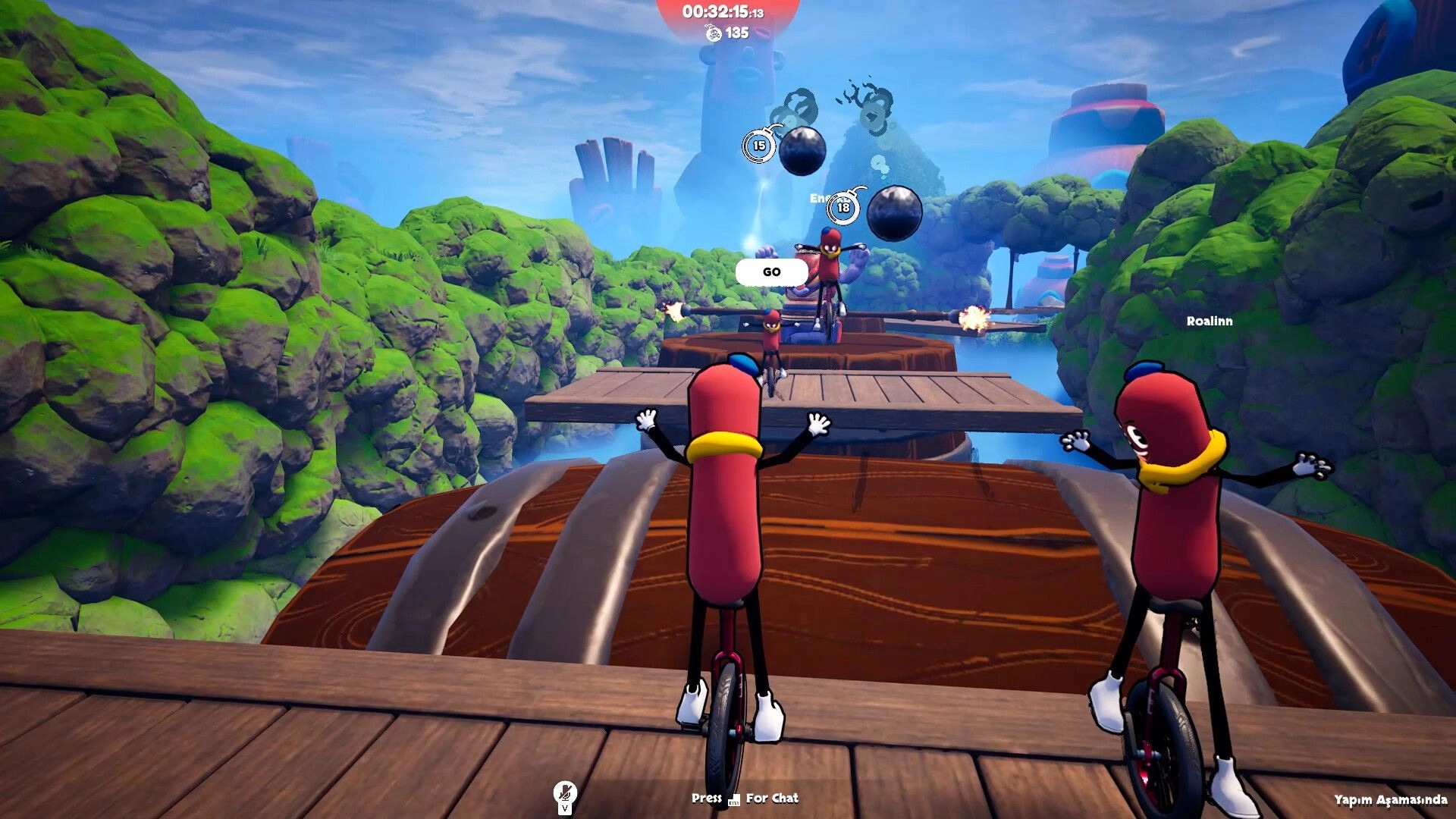 Unicycle Together: Sausage riders balance on unicycles on wooden platforms over a jungle canyon course.