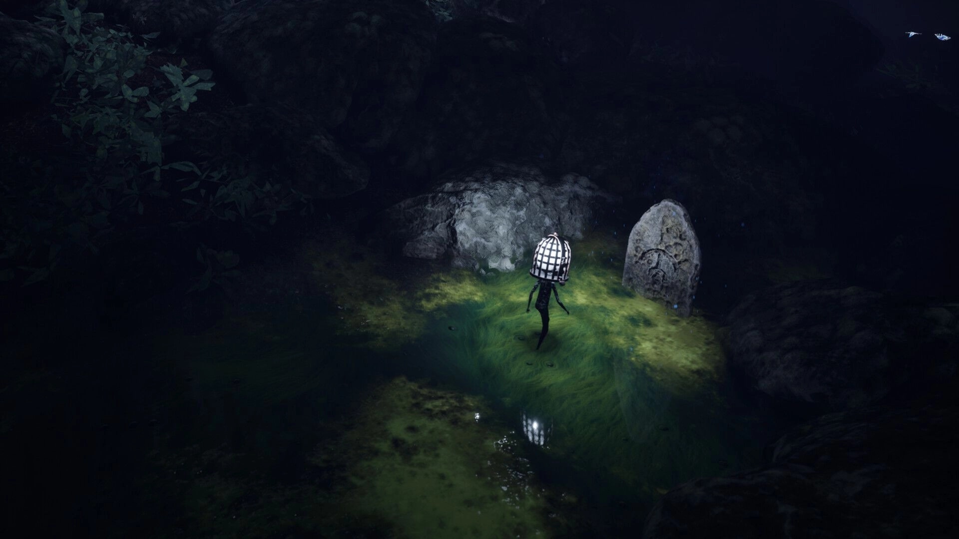 Unseal: Caged-head figure walks through a mossy pool beside carved stone markers in a dark ravine.