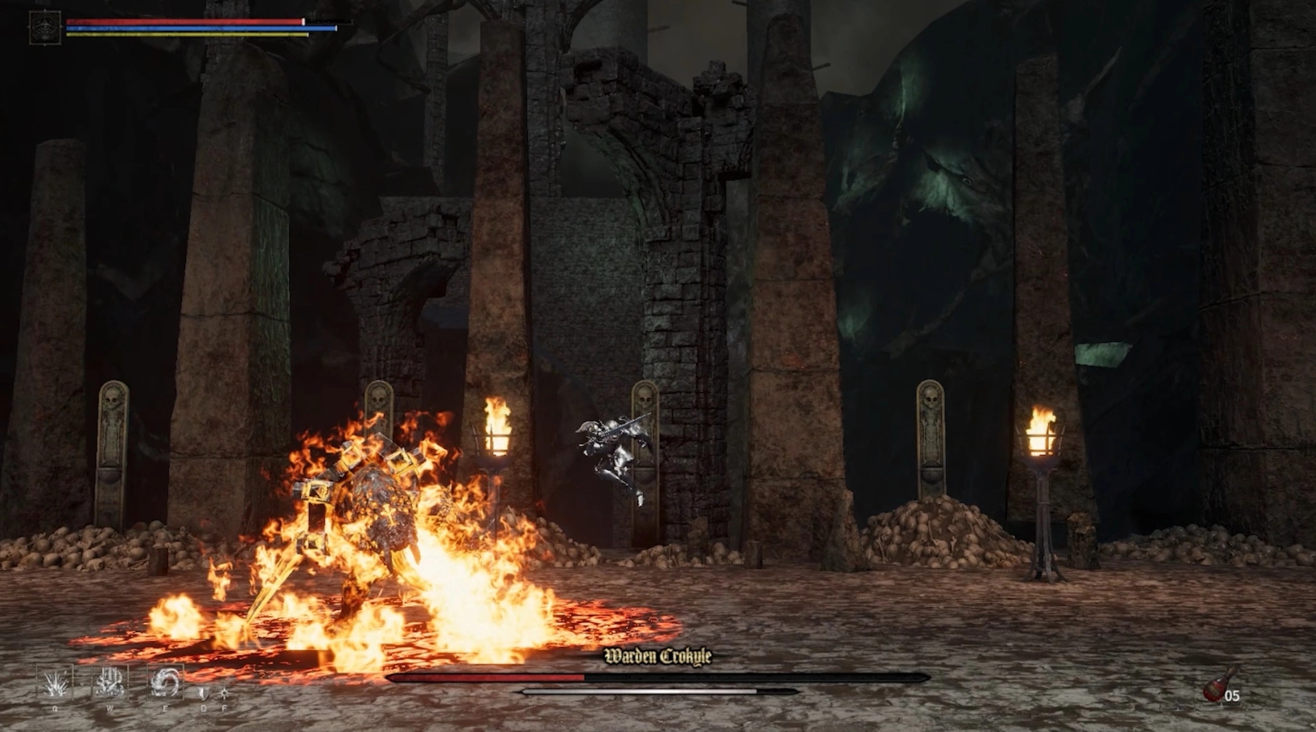 VELASTER: Player character jumps to attack flaming boss Warden Croxyle in ancient stone ruins.