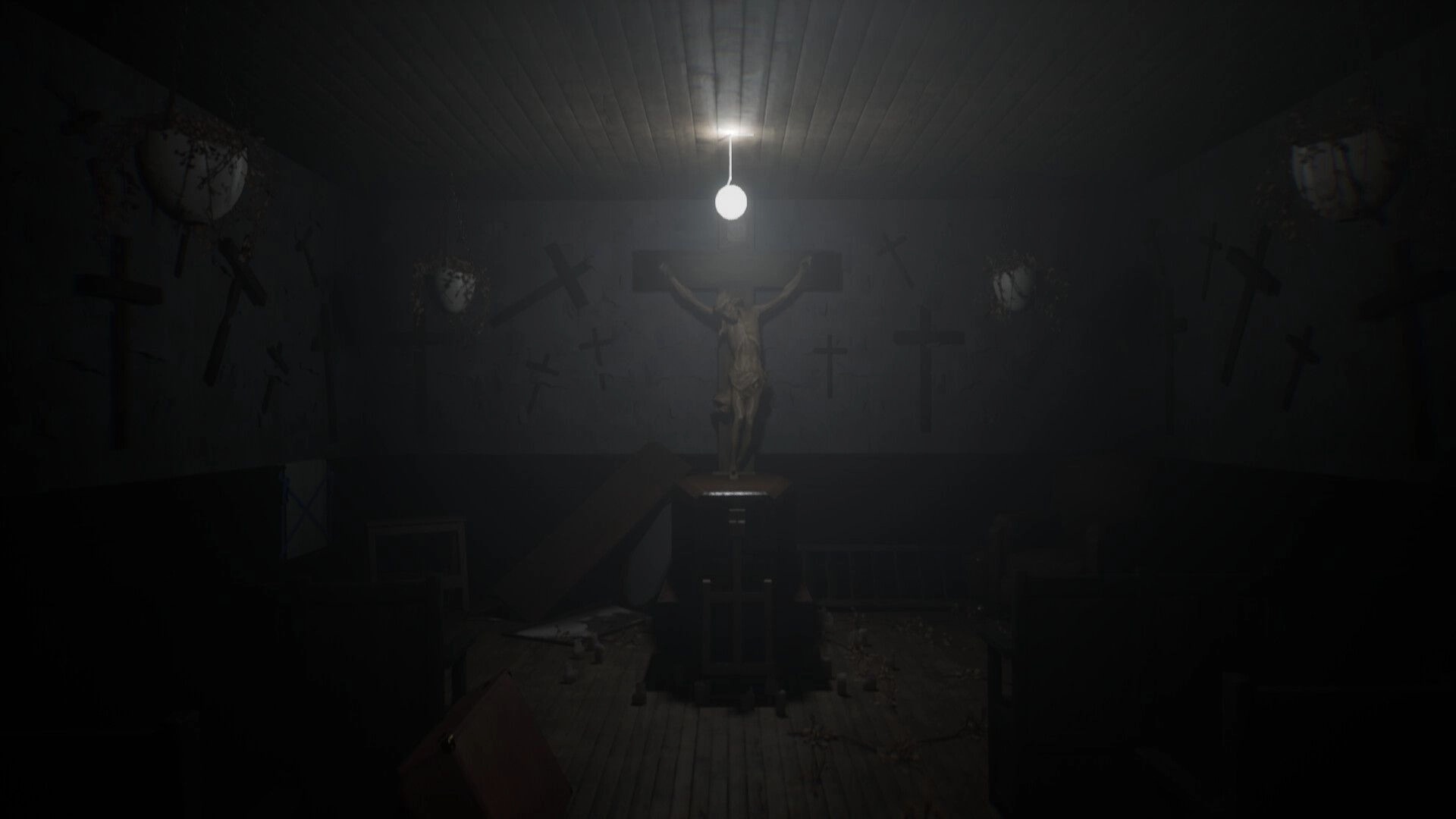 Vellar: First-person view of a crucifix statue under a bare bulb in a foggy chapel room.