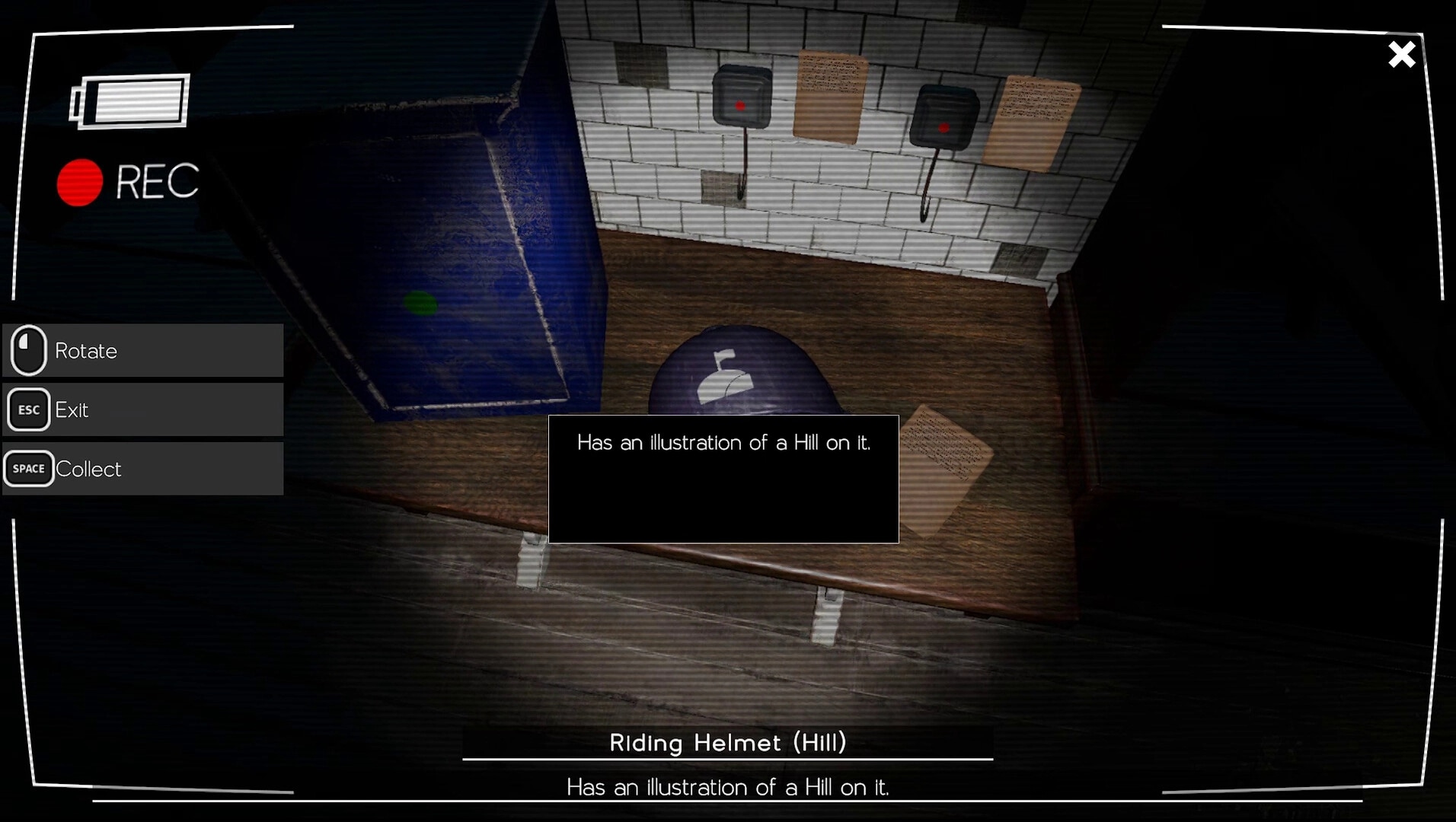 Vicious Cycle: Examining a riding helmet with hill illustration in a dimly lit room with control prompts